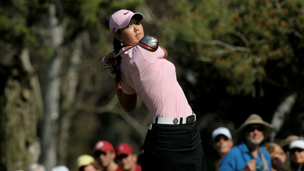 Michelle Wie hits her tee shot on the seventh hole