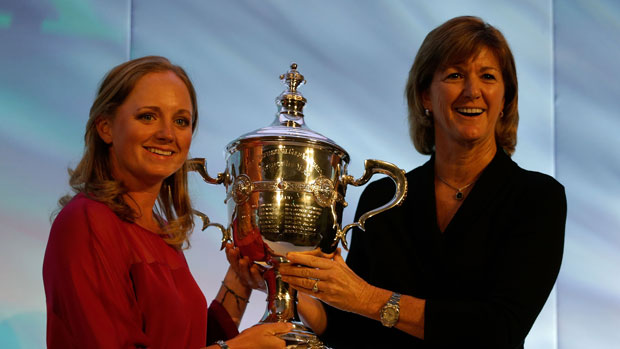 Stacy Lewis accepts Player of the Year Trophy from Beth Daniel