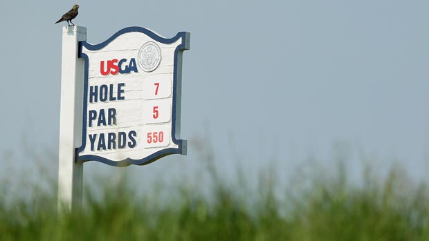 The tee sign on the seventh hole is seen during a practice round