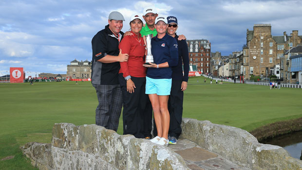Stacy Lewis poses with her family and the trophy on the Swilcan Bridge
