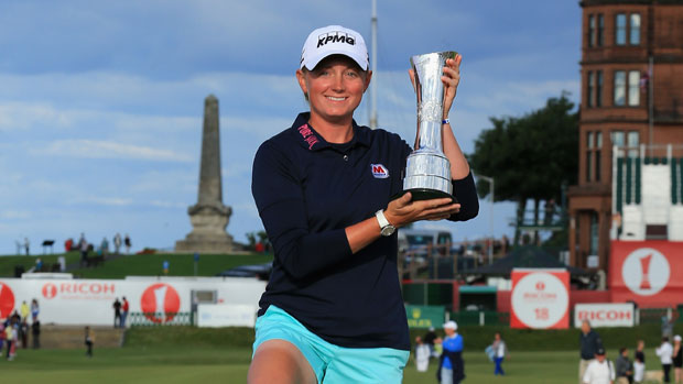 Stacy Lewis poses with the trophy on the Swilcan Bridge