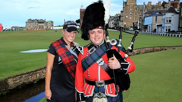 Natalie Gulbis poses with a piper on the 18th hole as a preview for the 2013 Ricoh Women's British Open 