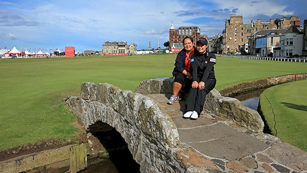 Moriya Jutanugarn poses with her mother on the Swilken Bridge on the 18th hole as a preview for the 2013 Ricoh Women's British Open