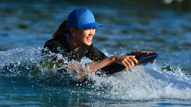Belen Mozo and Michelle Wie swim with the dolphins