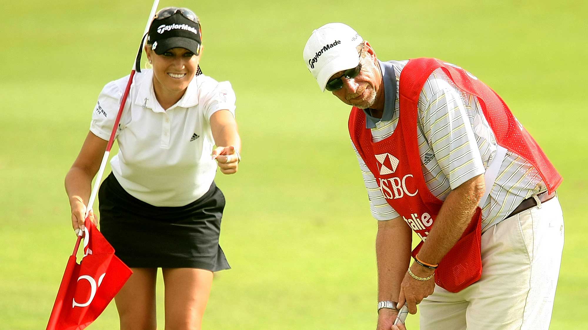 Natalie Gulbis of the USA lines up her caddie Greg Sheridan during the pro-am prior to the start of the HSBC Women's Champions at Tanah Merah Country Club on February 27, 2008 in Singapore.