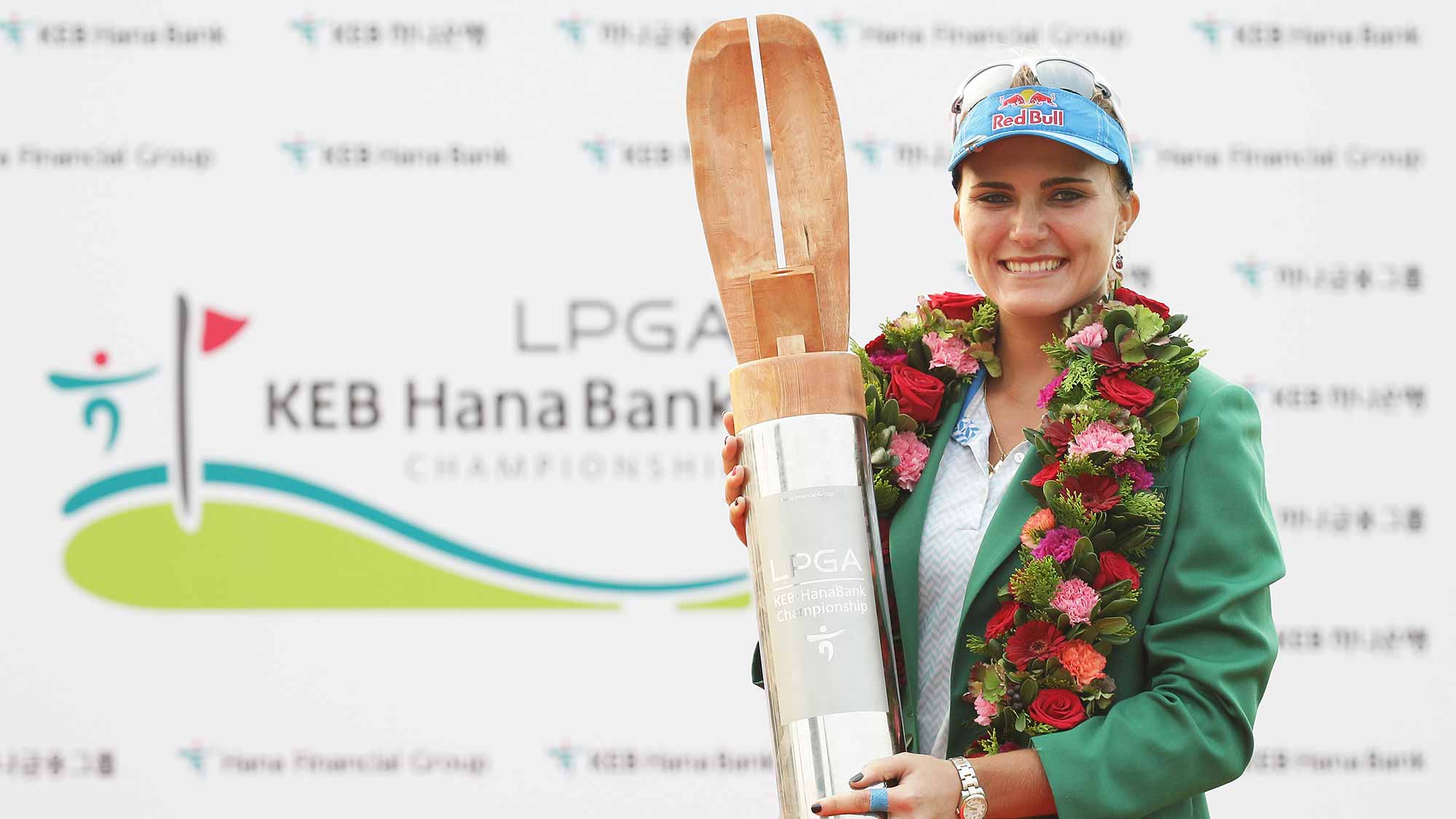 Lexi Thompson of United States lifts the winners trophy during a ceremony following the LPGA KEB Hana Bank