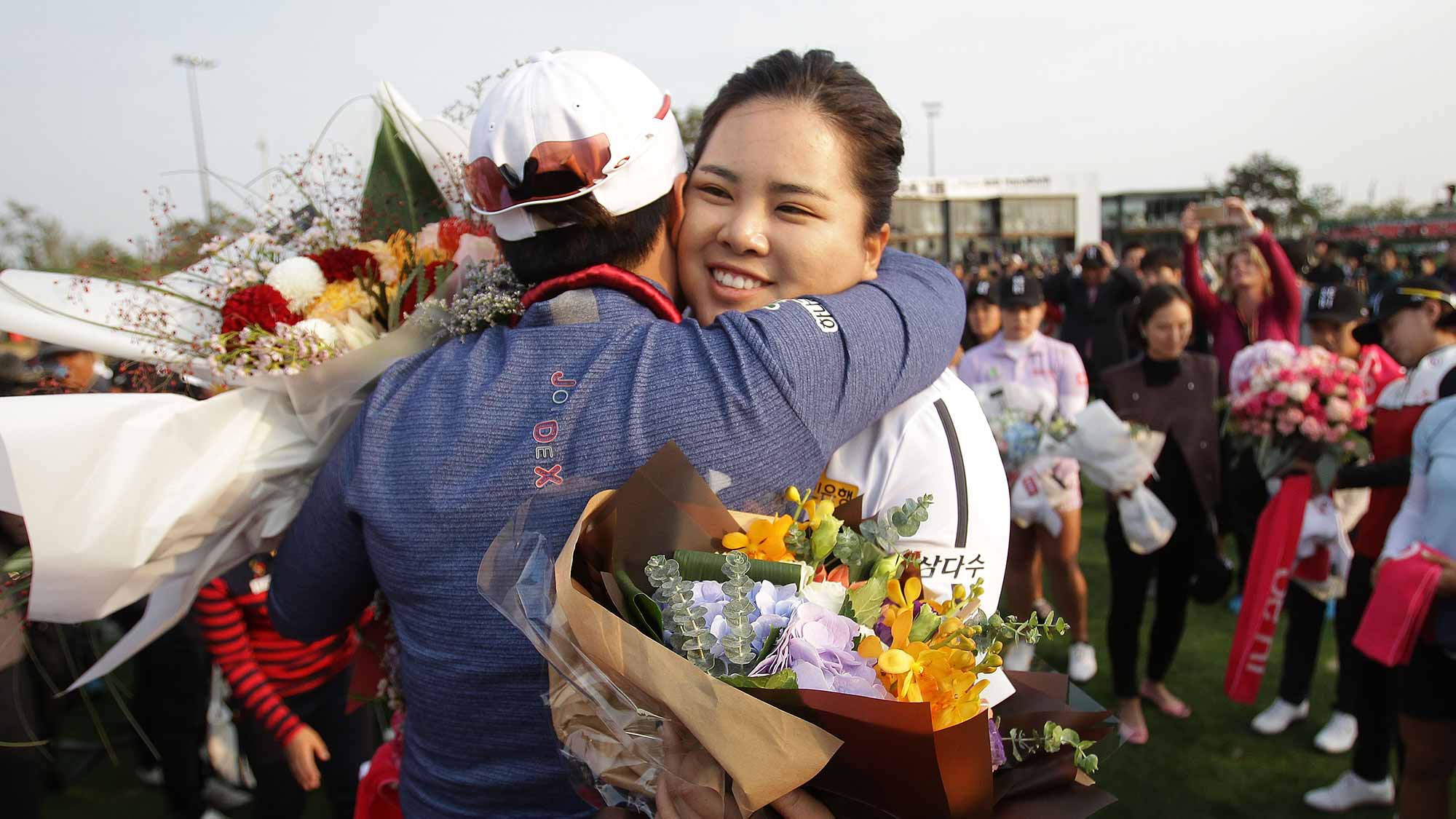 Se-Ri Pak of South Korea hugs with Inbee Park of South Korea during her retirement ceremony on the 18th green after the first round of the LPGA KEB-Hana Bank Championship at the Sky 72 Golf Club Ocean Course 