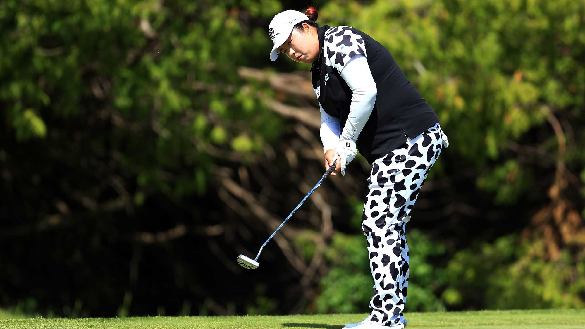 Shanshan Feng of China putts on the 17th hole during the first round of the Manulife LPGA Classic