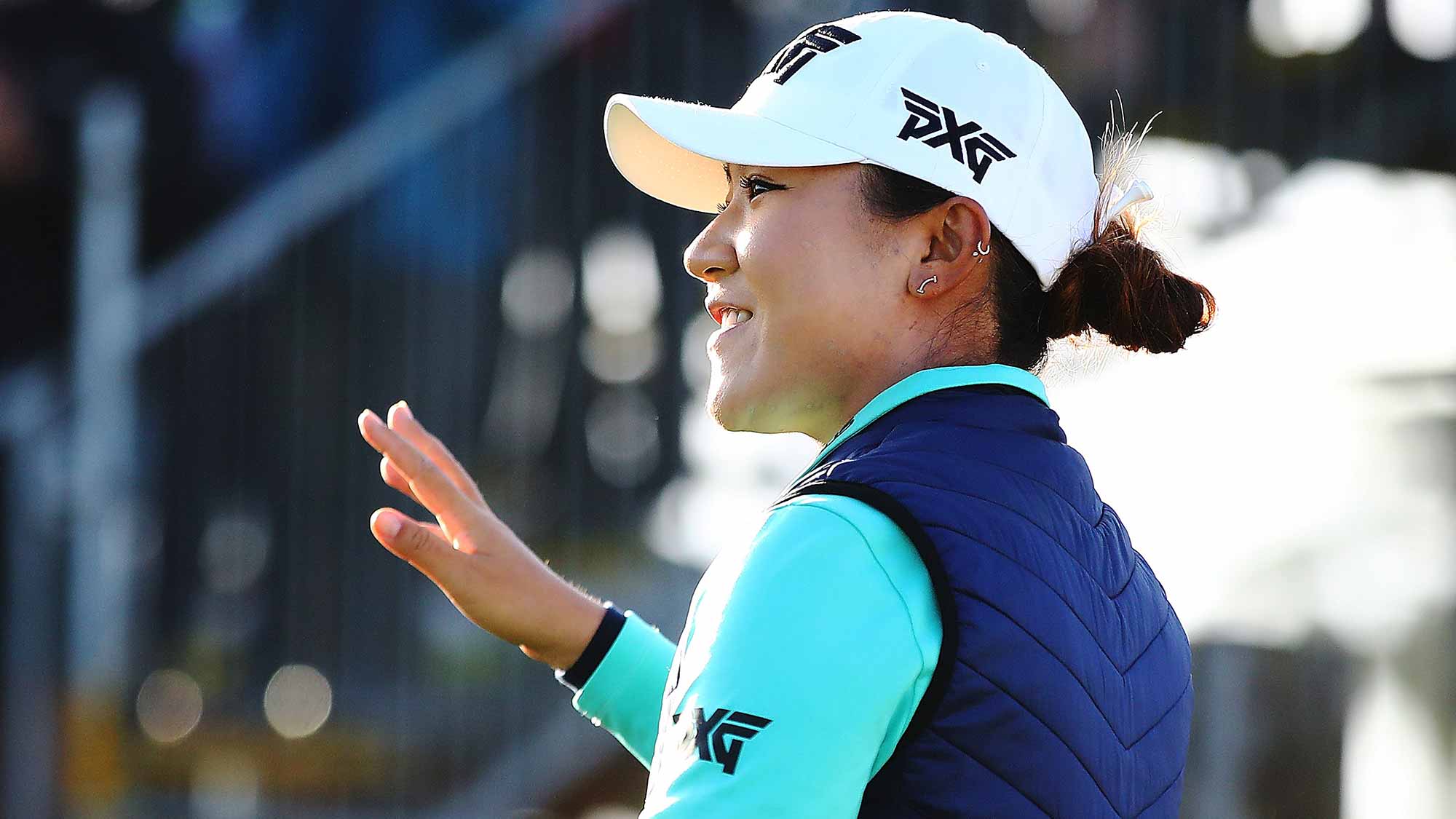 Lydia Ko of New Zealand acknowledges the crowd during day one of the McKayson New Zealand Women's Open at Windross Farm
