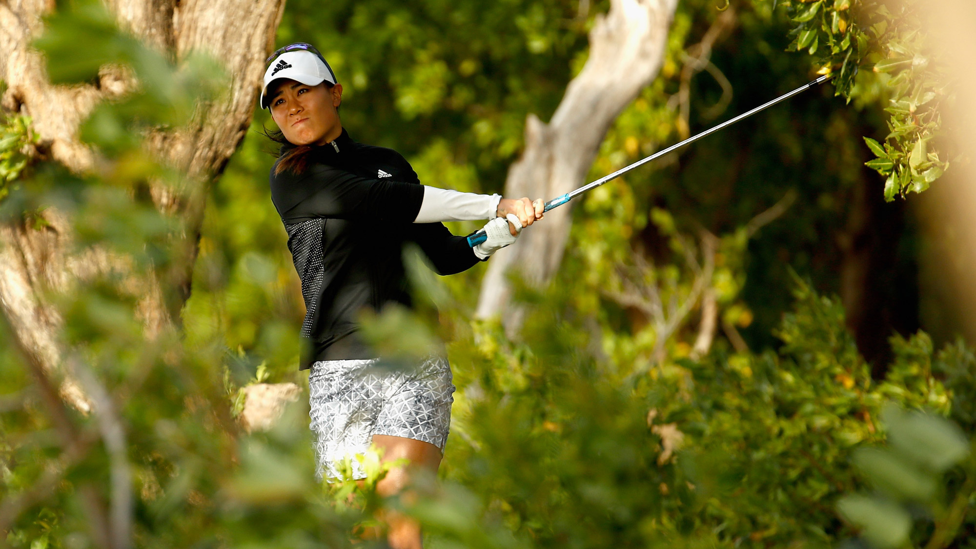 Danielle Kang hits her second shot on the first hole during the second round of the Pure Silk Bahamas LPGA Classic