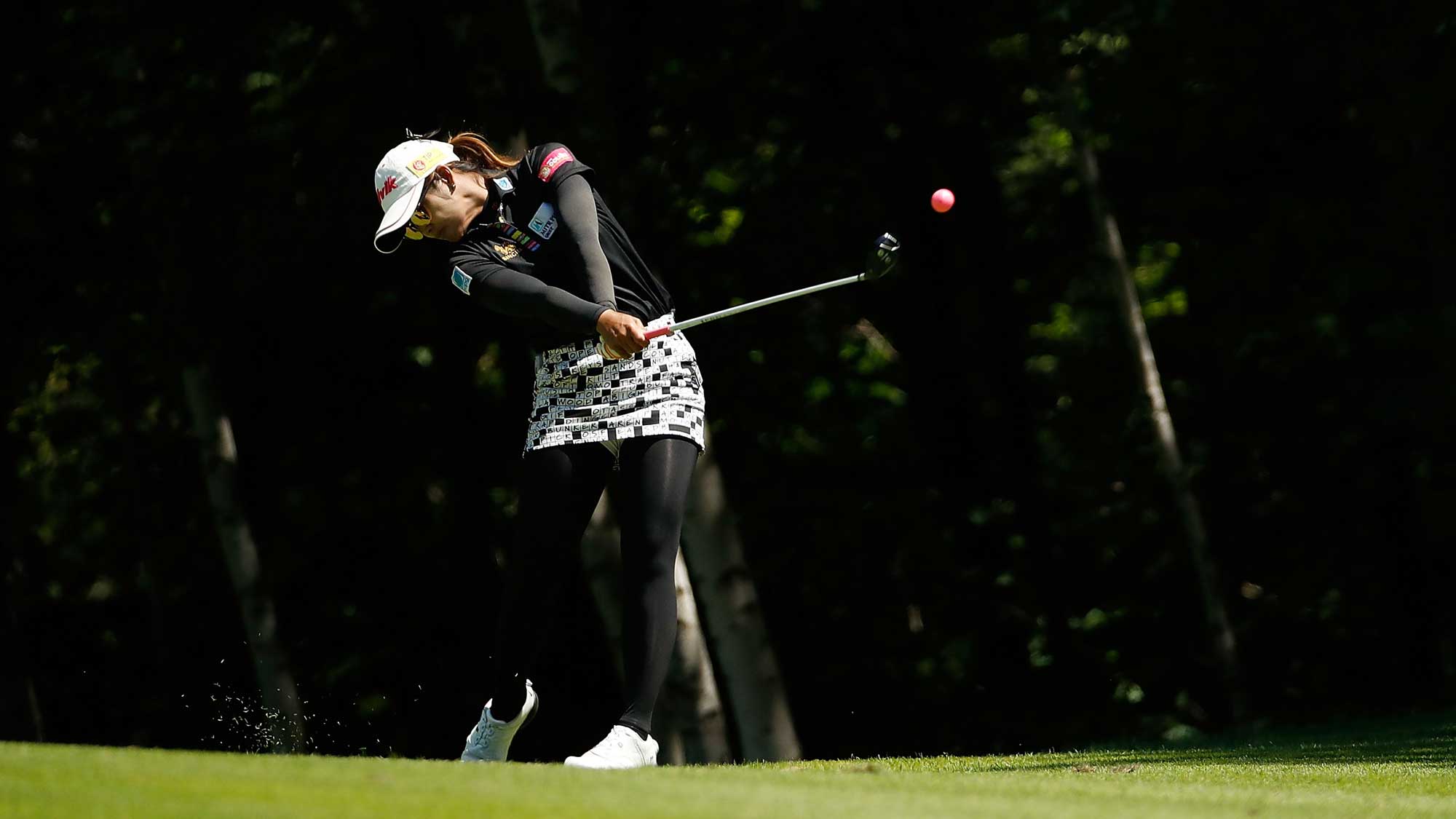 Pornanong Phatlum of Thailand hits her second shot on the first hole during the third round of the Thornberry Creek LPGA Classic