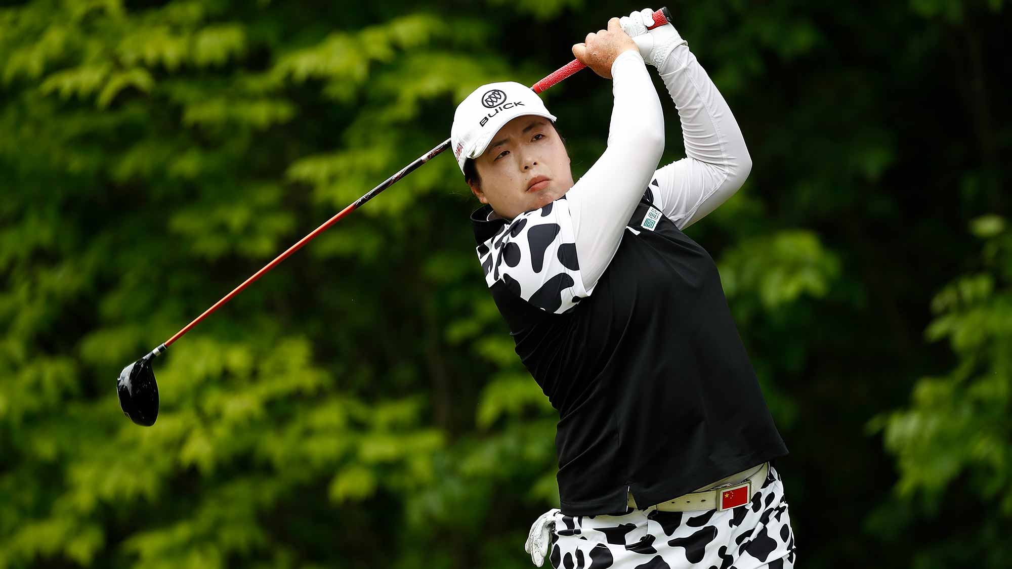 Shanshan Feng of China watches her drive on the fourth hole during the third round of the LPGA Volvik Championship on May 27, 2017 at Travis Pointe Country Club Ann Arbor, Michigan