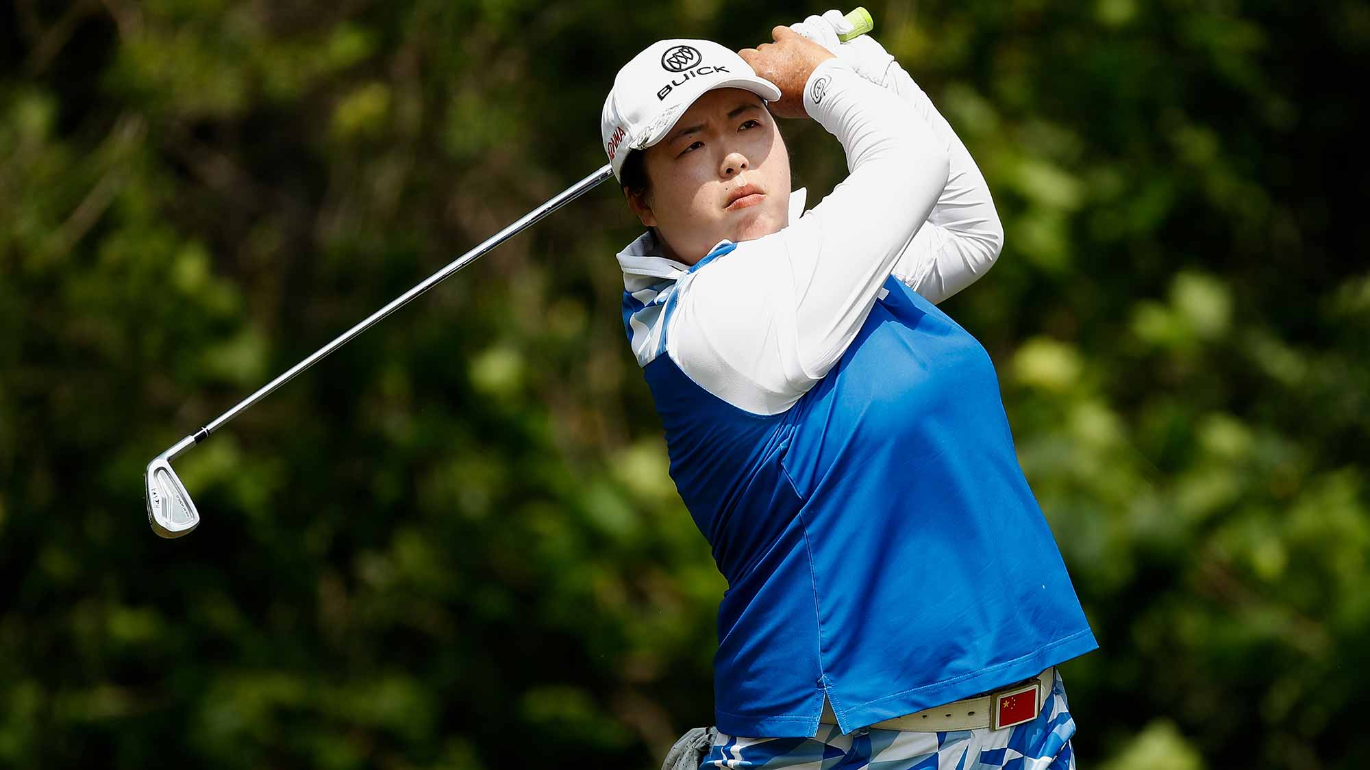 Shanshan Feng of China watches her tee shot on the seventh hole during the final round of the LPGA Volvik Championship on May 28, 2017 at Travis Pointe Country Club Ann Arbor, Michigan