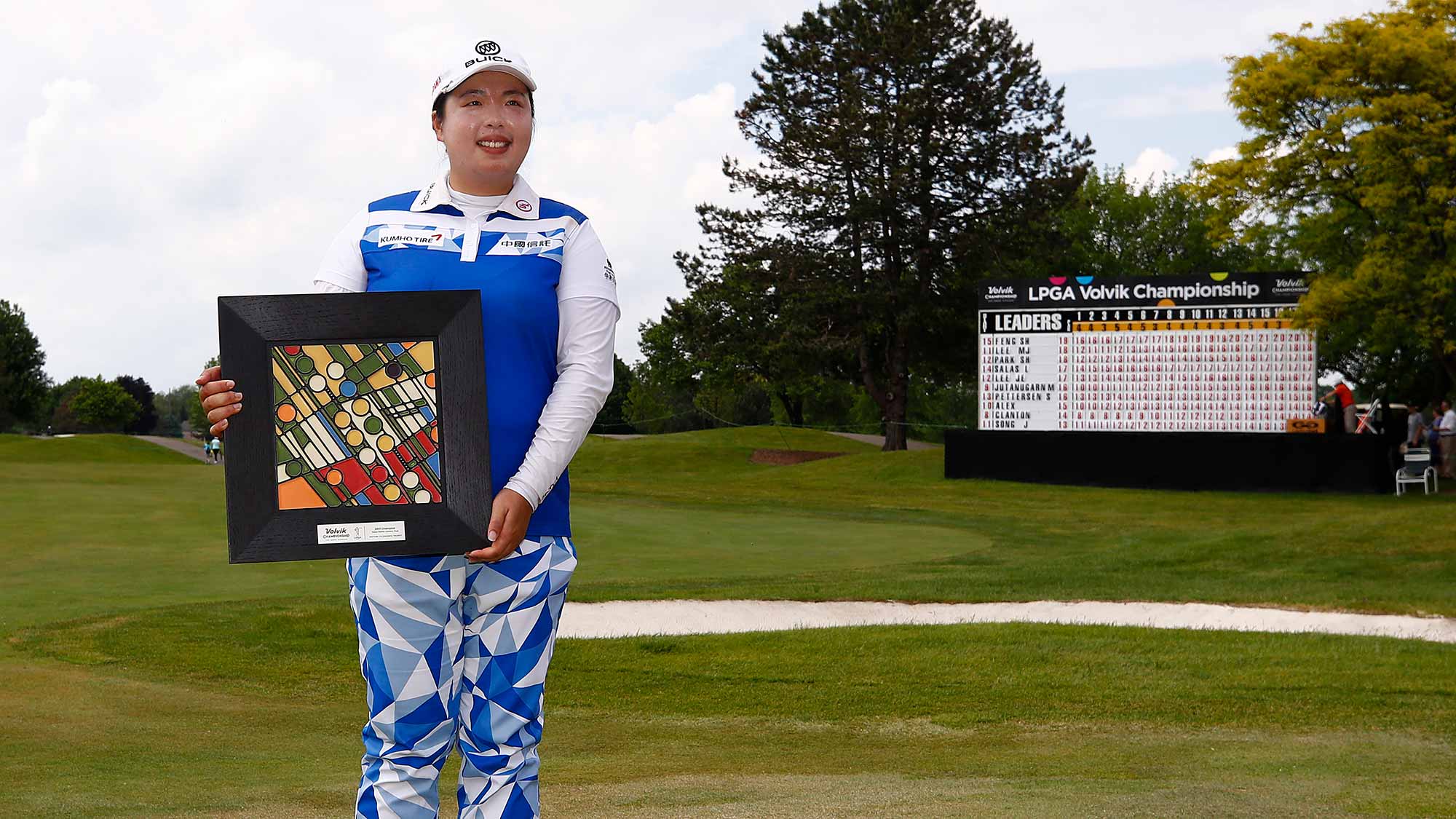 Shanshan Feng of China poses with the championship trophy after winning the LPGA Volvik Championship on May 28, 2017 at Travis Pointe Country Club Ann Arbor, Michigan
