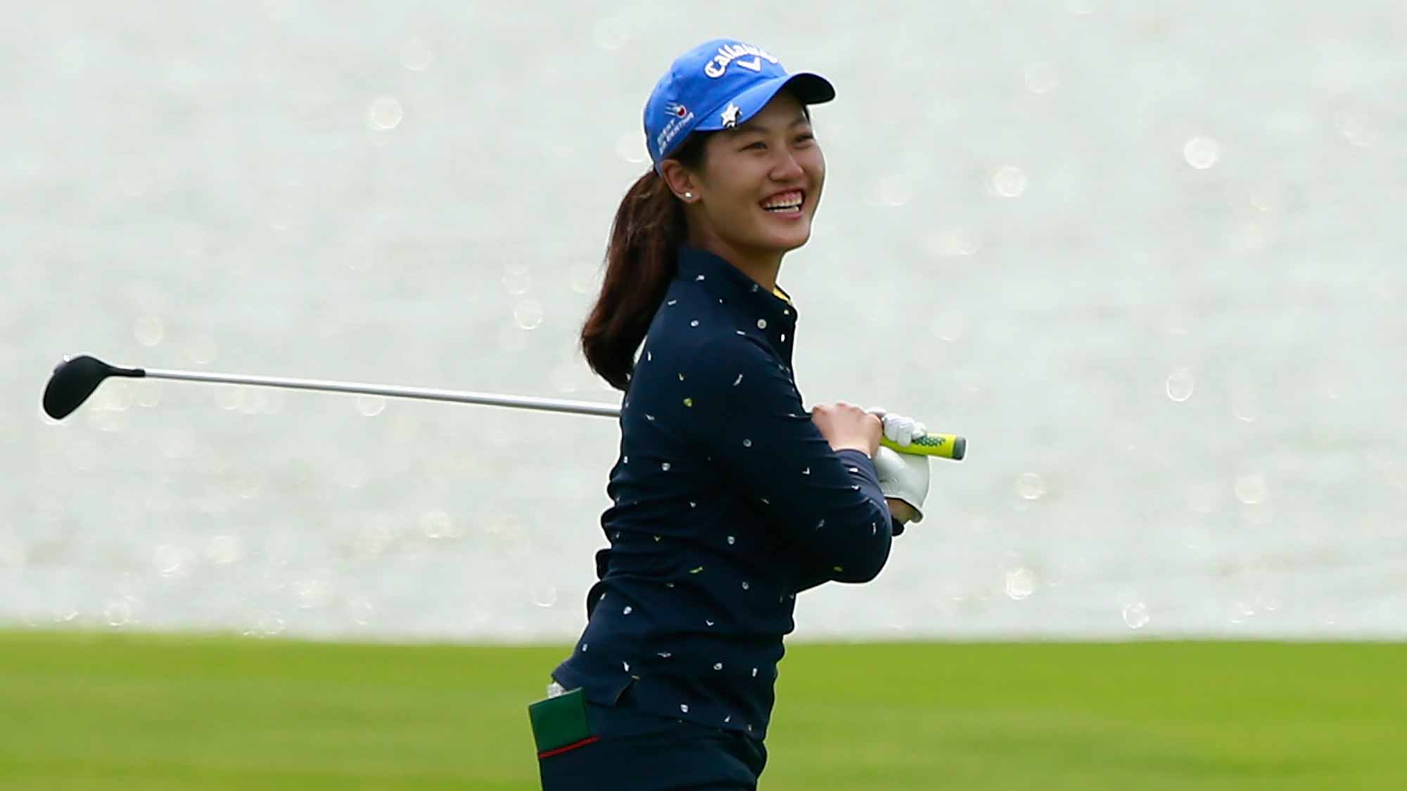 Xiyu Lin of China reacts after her approaching shot to 18th hole during Round 2 of Blue Bay LPGA