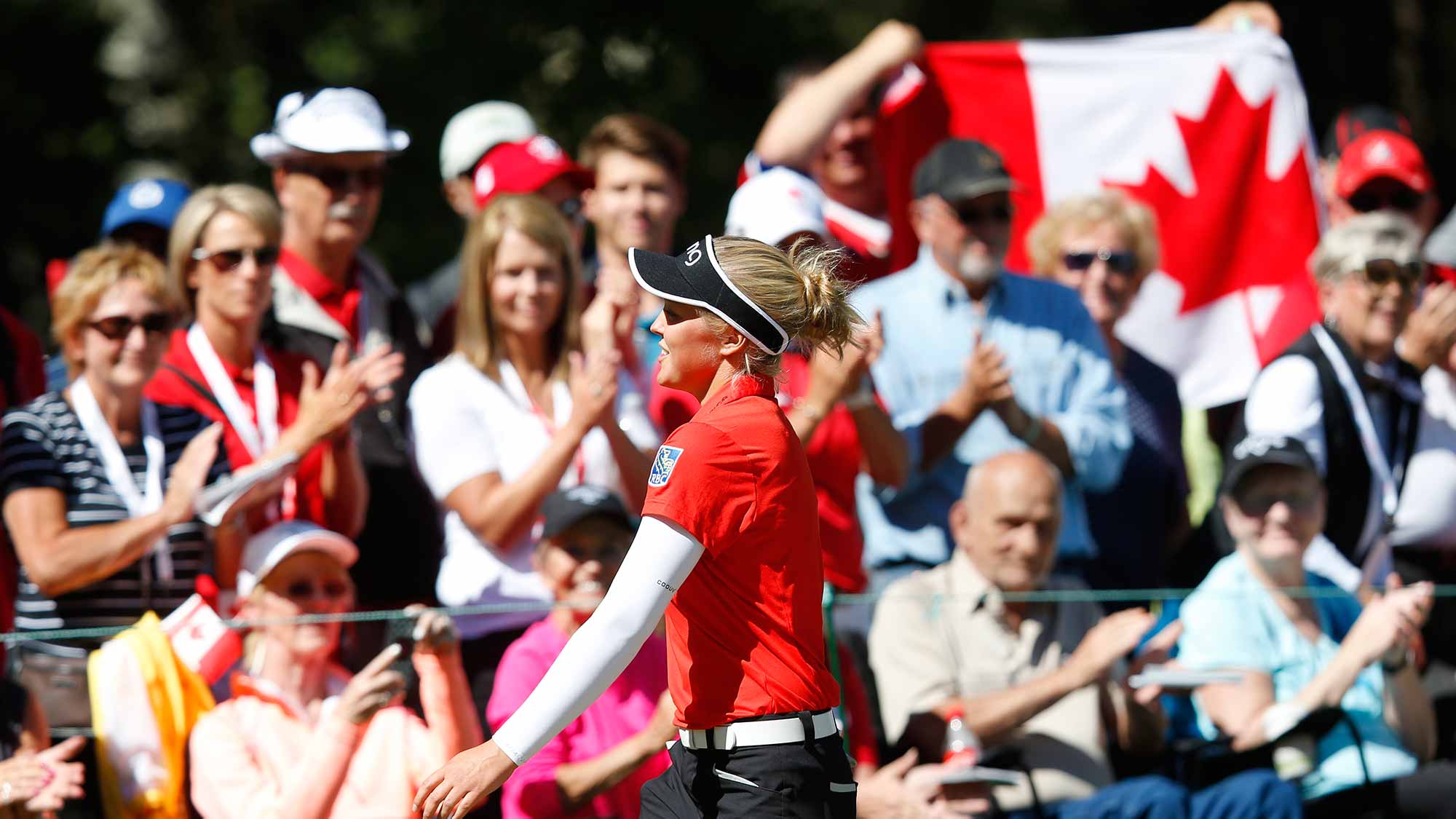 Brooke Henderson reacts to the fans at the end of her second round of the Canadian Pacific Women's Open at Priddis Greens Golf and Country Club