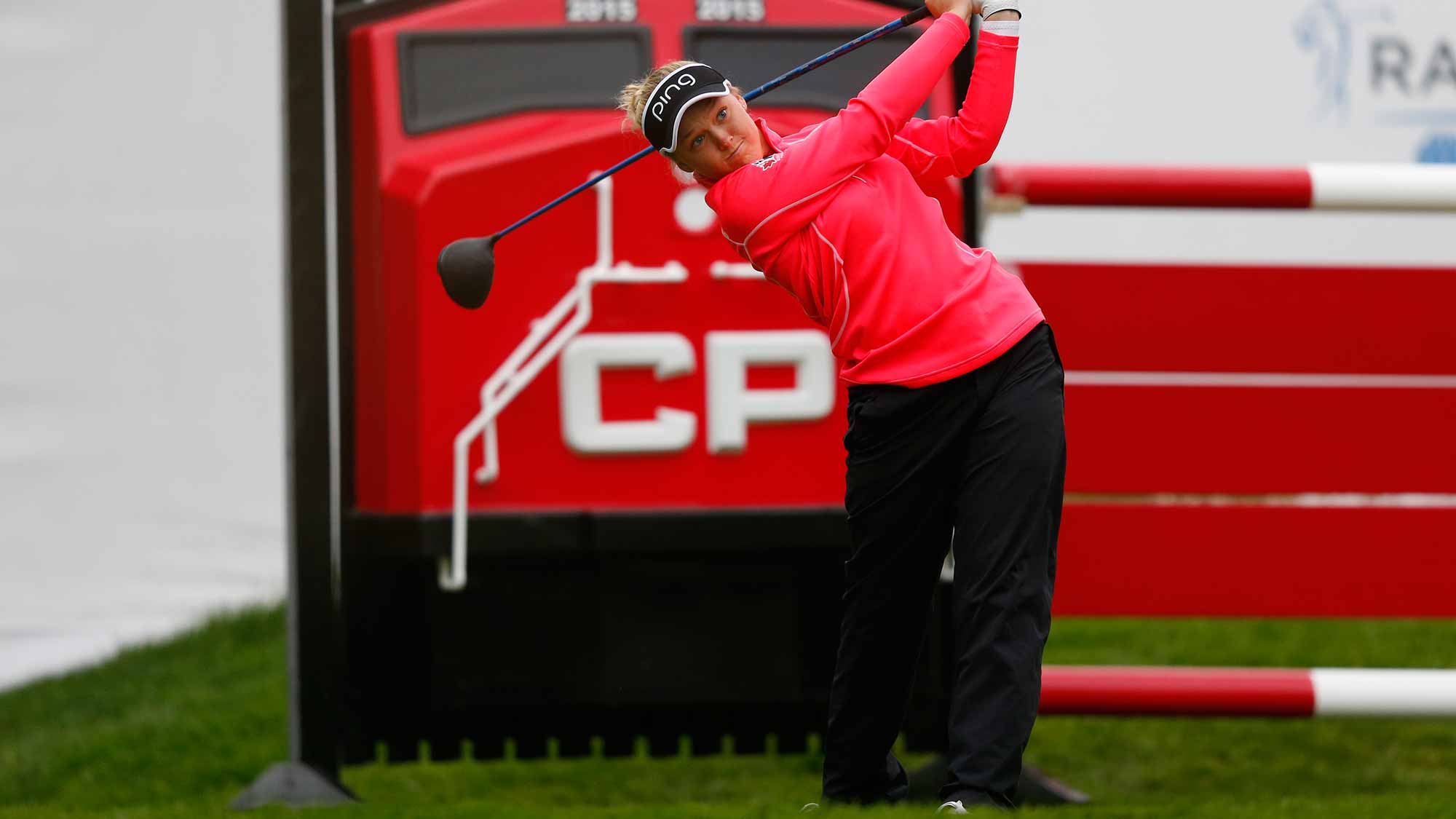 Brooke Henderson of Canada tees off on the first hole during the third round of the Canadian Pacific Women's Open at Priddis Greens Golf and Country Club