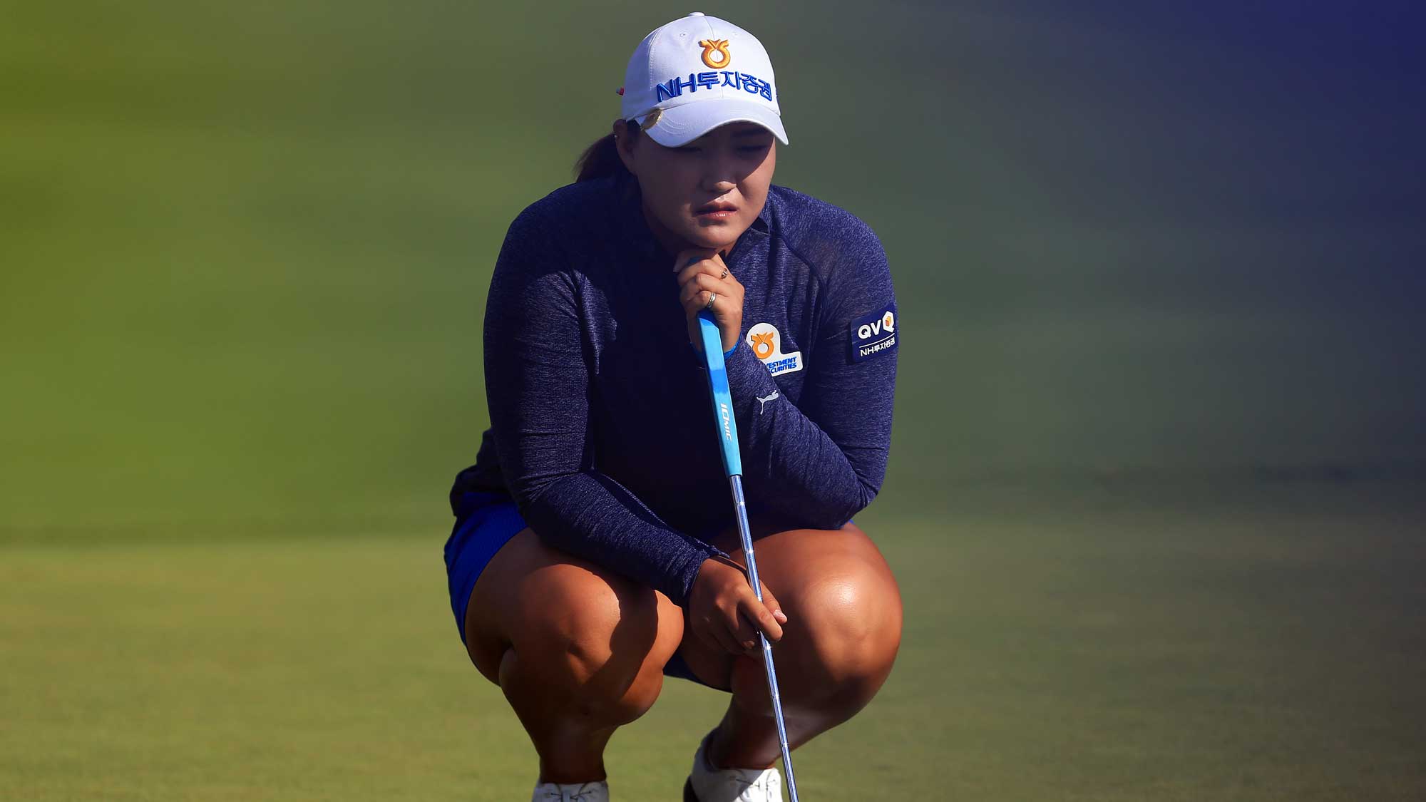 Mirim Lee of South Korea eyes up a putt on the 18th green during round three of the Canadian Pacific Women's Open