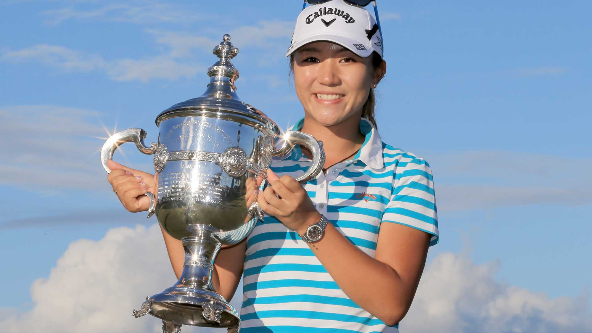 Lydia Ko of New Zealand poses with the Rolex Player of the Year trophy during the final round of the CME Group Tour Championship at Tiburon Golf Club