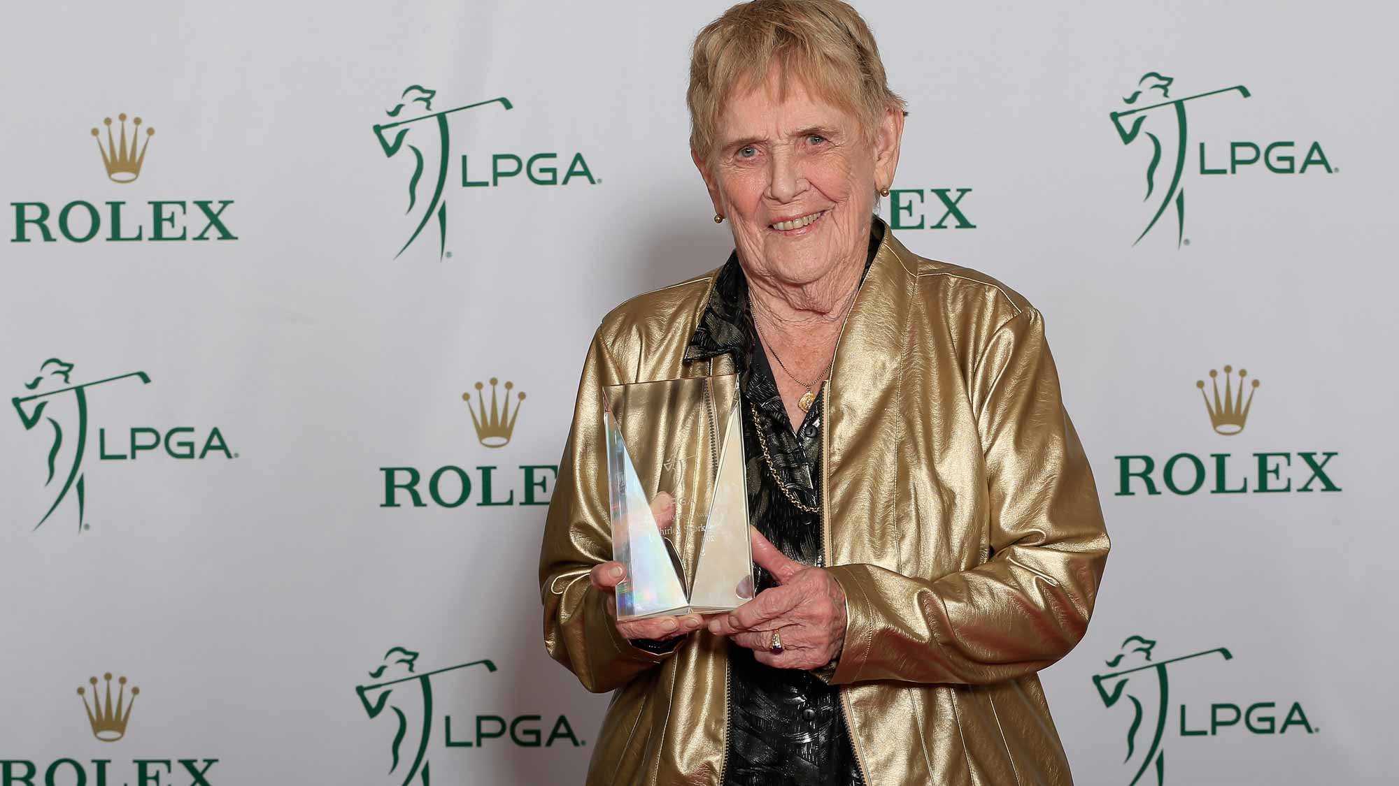 Shirley Spork, one of the LPGA founders, poses with the Patty Berg Award at the LPGA Rolex Players Awards at the Ritz-Carlton, Naples