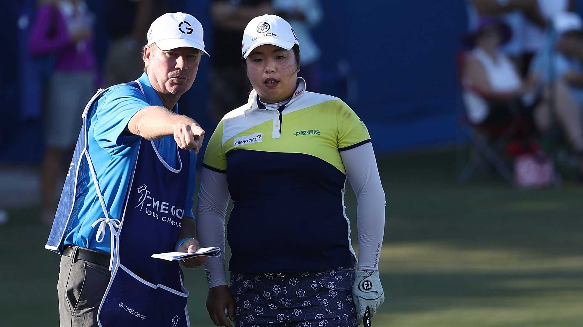 Shanshan Feng of China prepares to play her shot on the second hole during the first round of the CME Group Tour Championship at Tiburon Golf Club