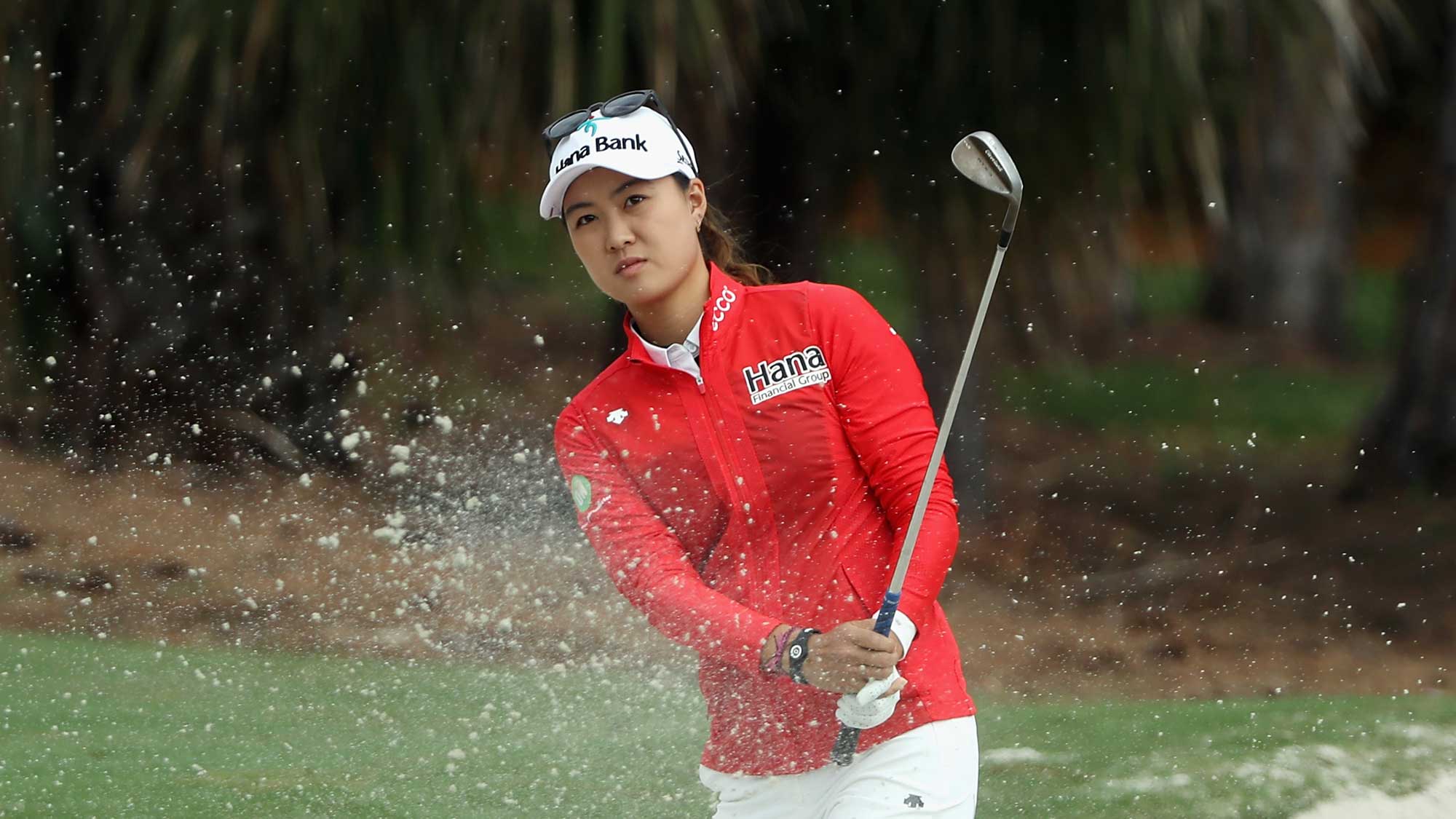 Minjee Lee of Australia plays a shot from a greenside bunker on the sixth hole during round one of the CME Group Tour Championship