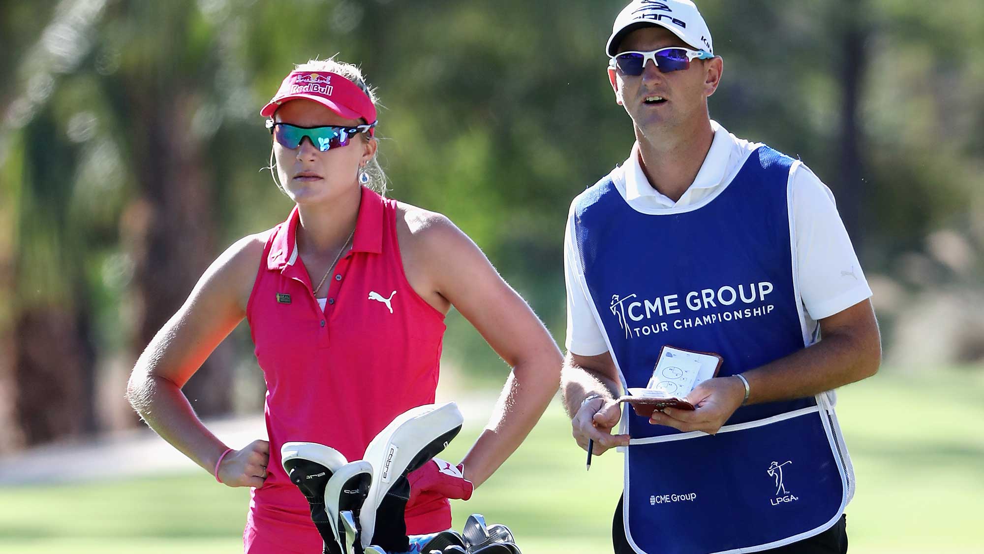 Lexi Thompson of the United States stands with caddie Kevin McAlpine on the second hole during round three of the CME Group Tour Championship