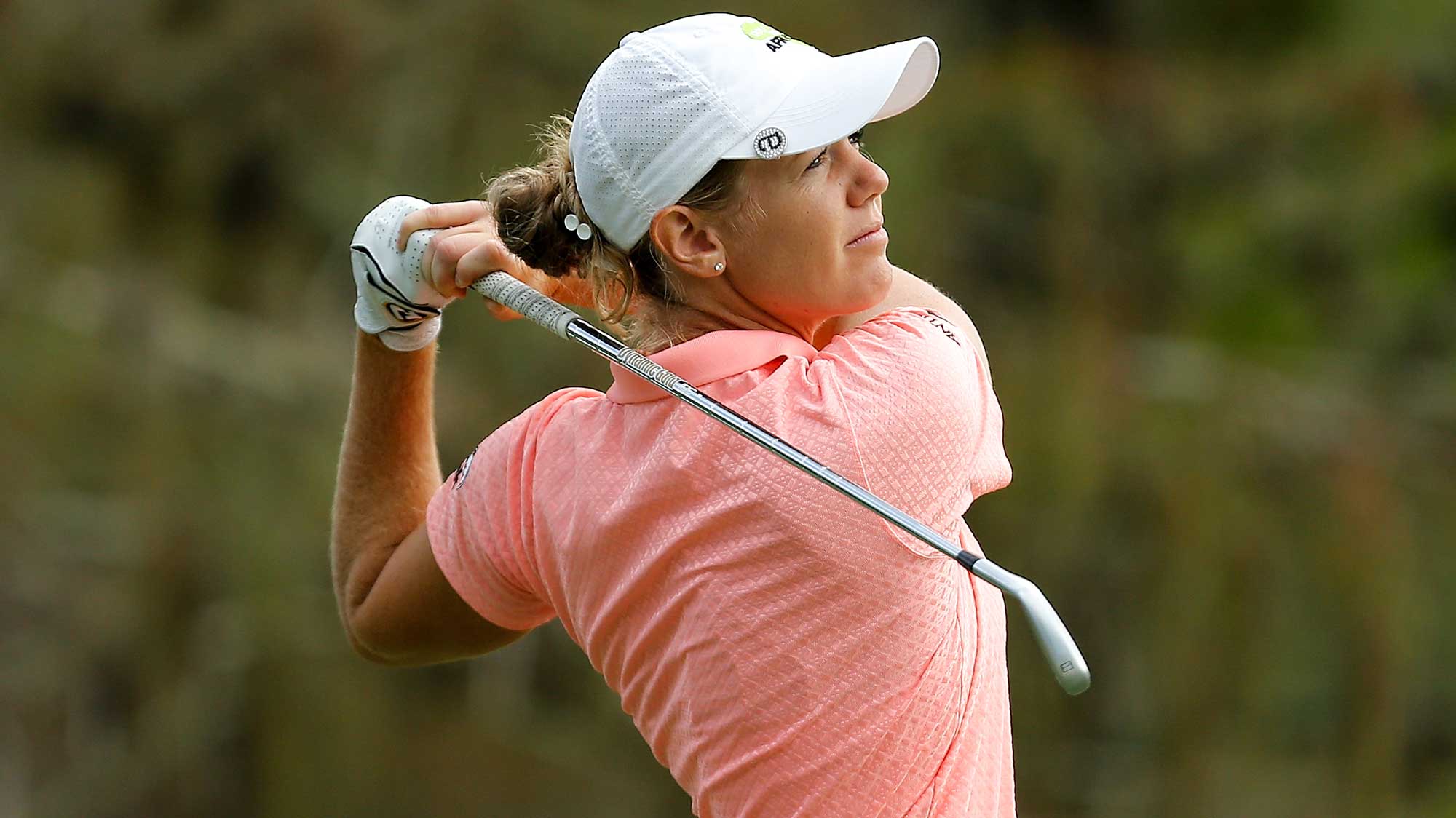 Amy Olson plays her shot from the eighth tee during the first round of the CME Group Tour Championship