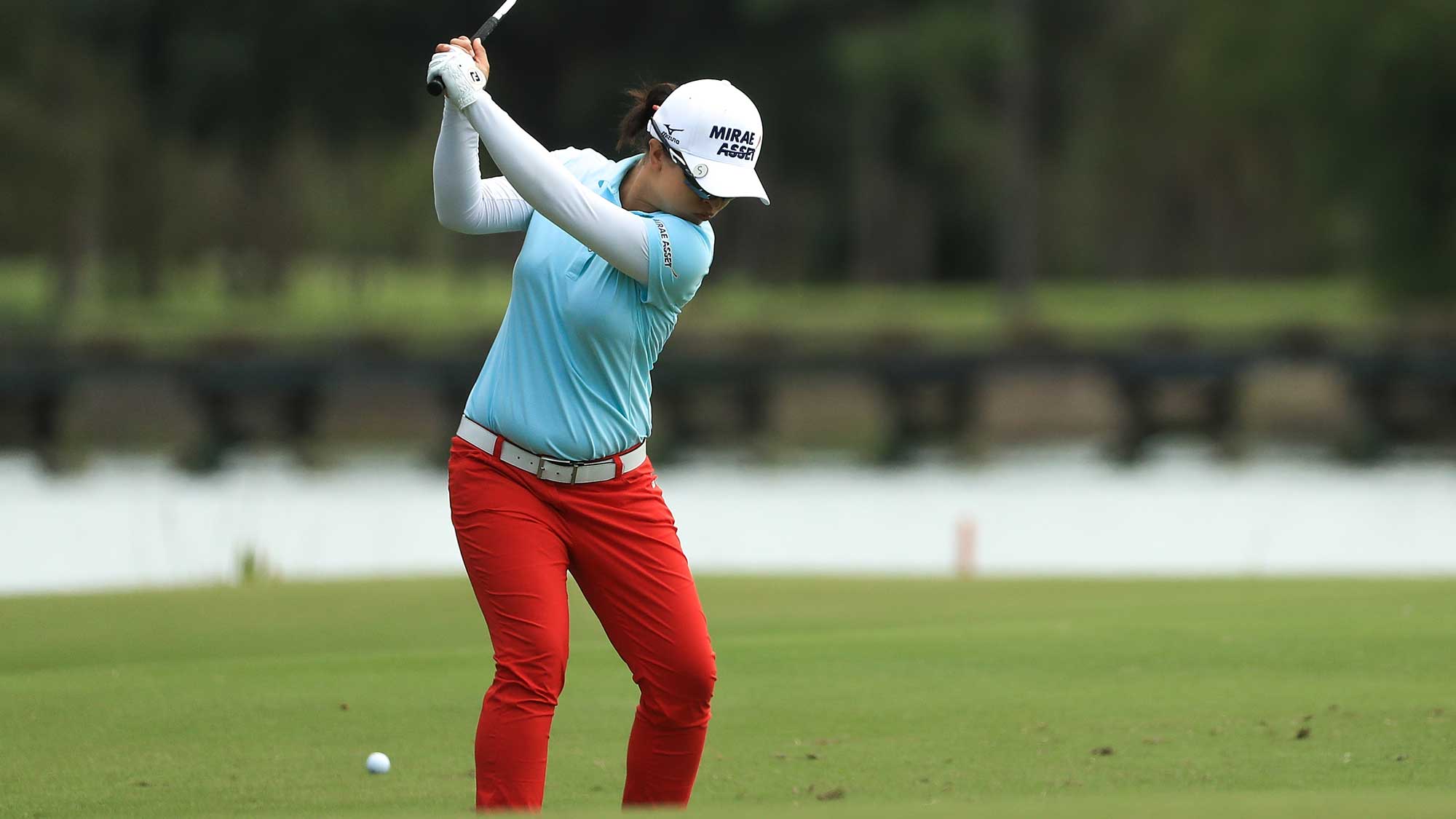 Sei Young Kim of Korea plays her second shot on the first hole during the final round of the LPGA CME Group Tour Championship