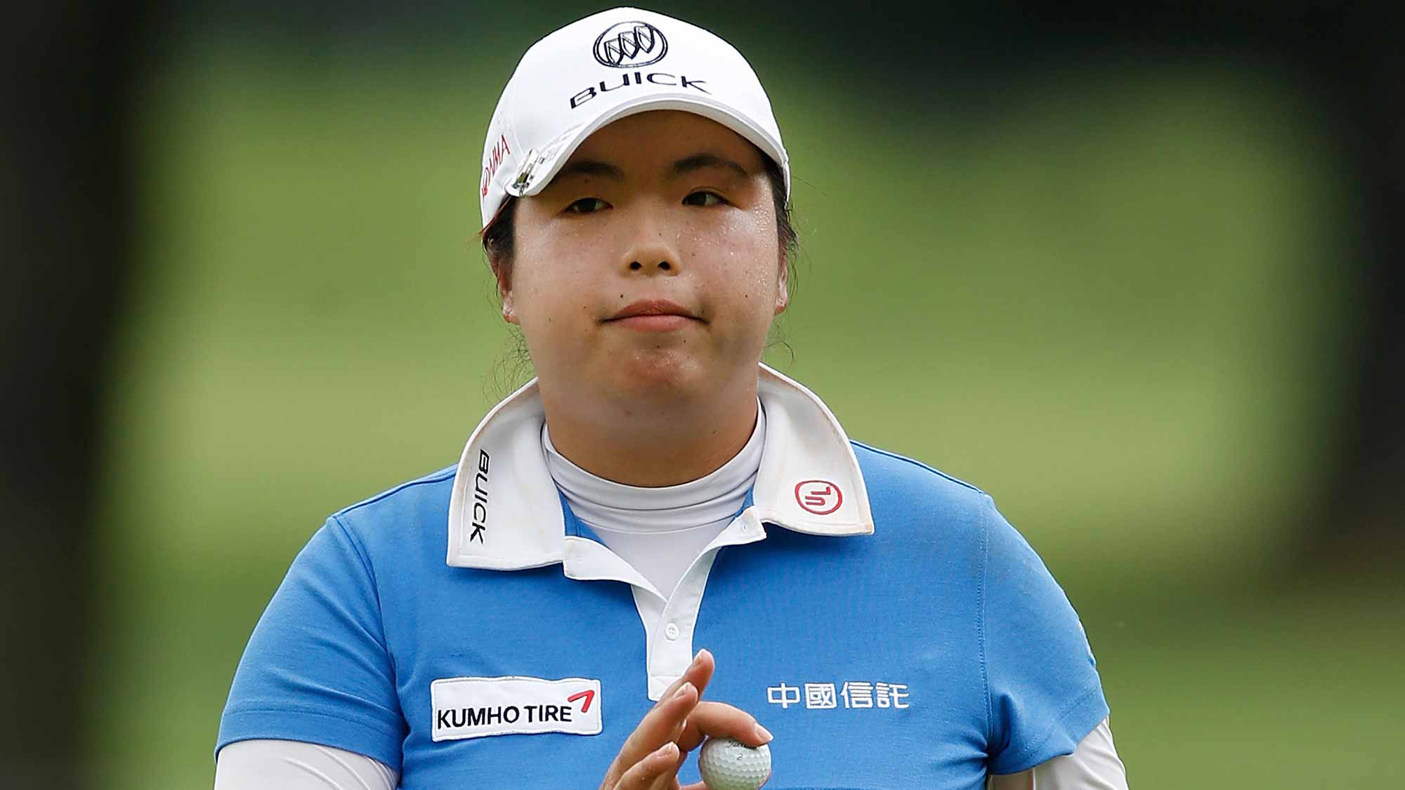 Shanshan Feng of China waves to fans after making a birdie putt on the 17th green during the second round of the Marathon Classic presented by Owens Corning and O-I at Highland Meadows Golf Club
