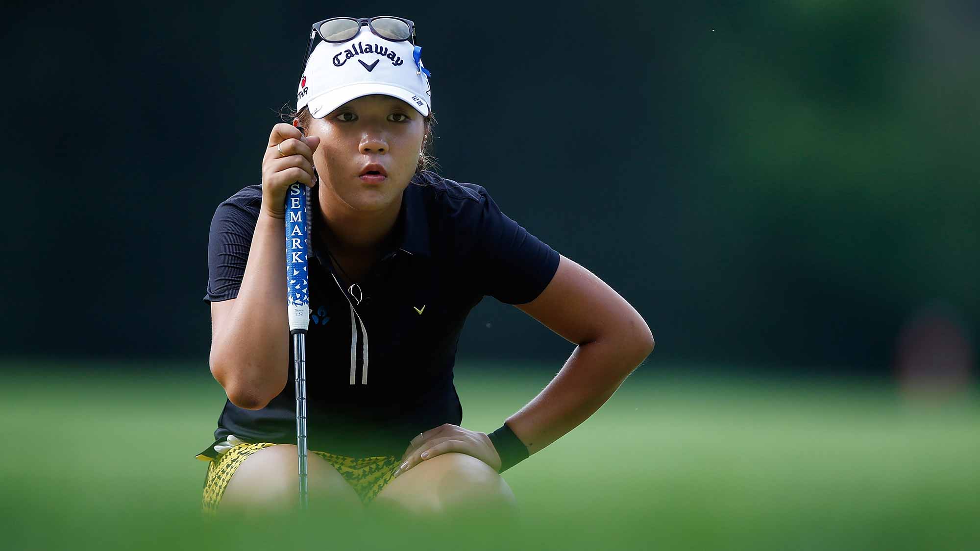 Lydia Ko of New Zealand reads a putt on the 17th green during the third round of the Marathon Classic presented by Owens Corning and O-I at Highland Meadows Golf Club