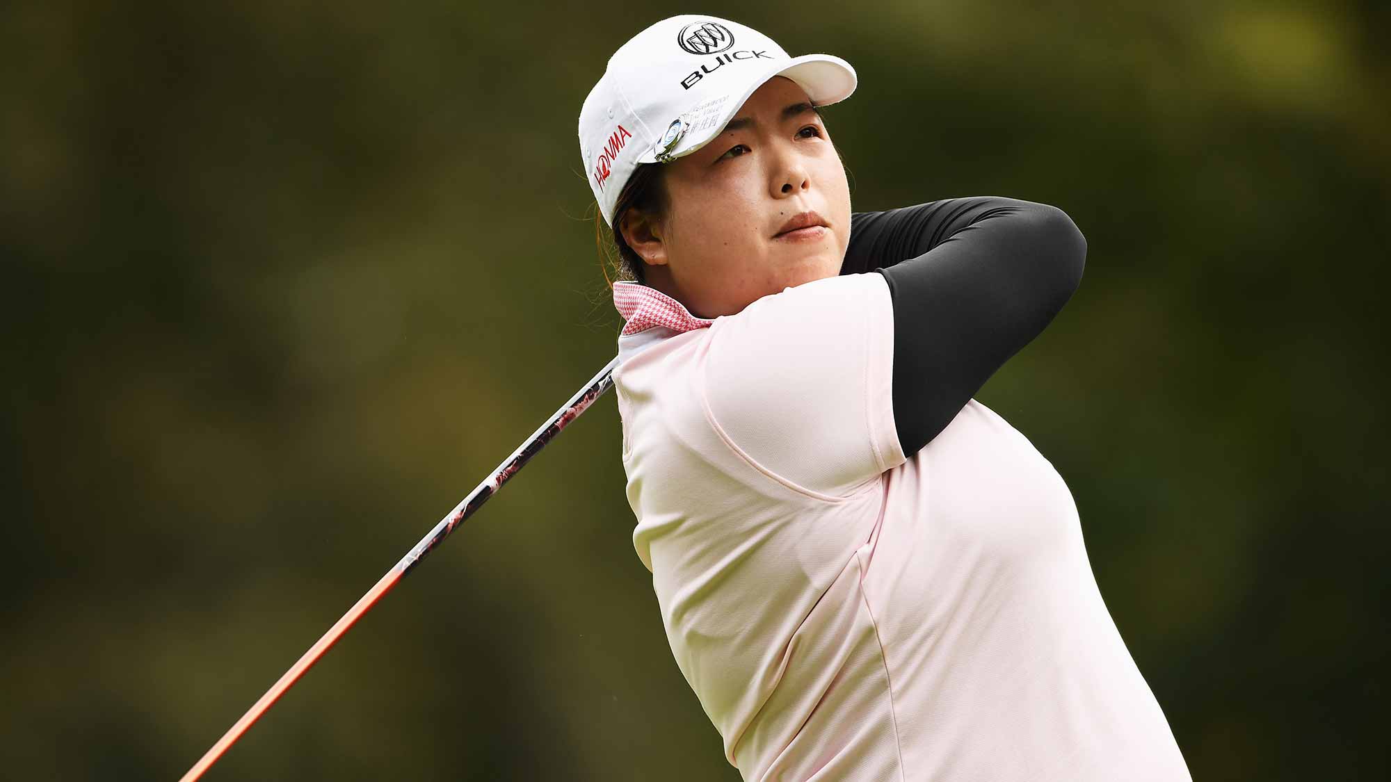 Shanshan Feng of China plays a shot during the third round of The Evian Championship