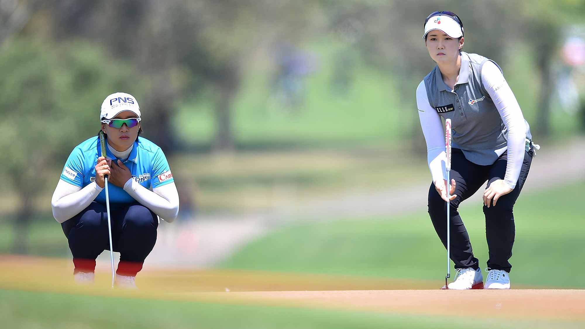 Amy Yang and Q Baek of South Korea looks on during day two of the 2016 Honda LPGA Thailand at Siam Country Club