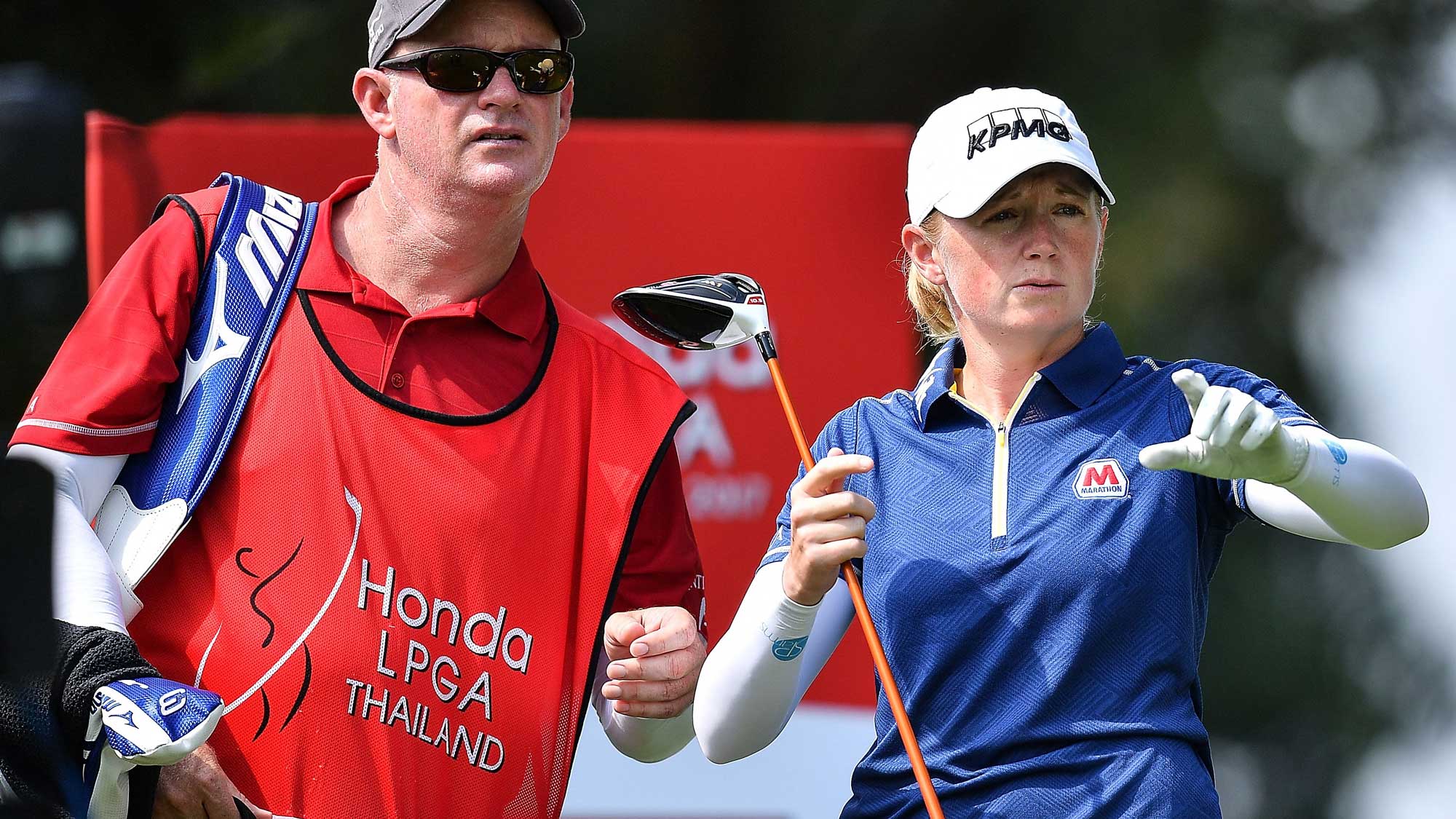 Stacy Lewis of United States talks with her caddy during the Honda LPGA Thailand