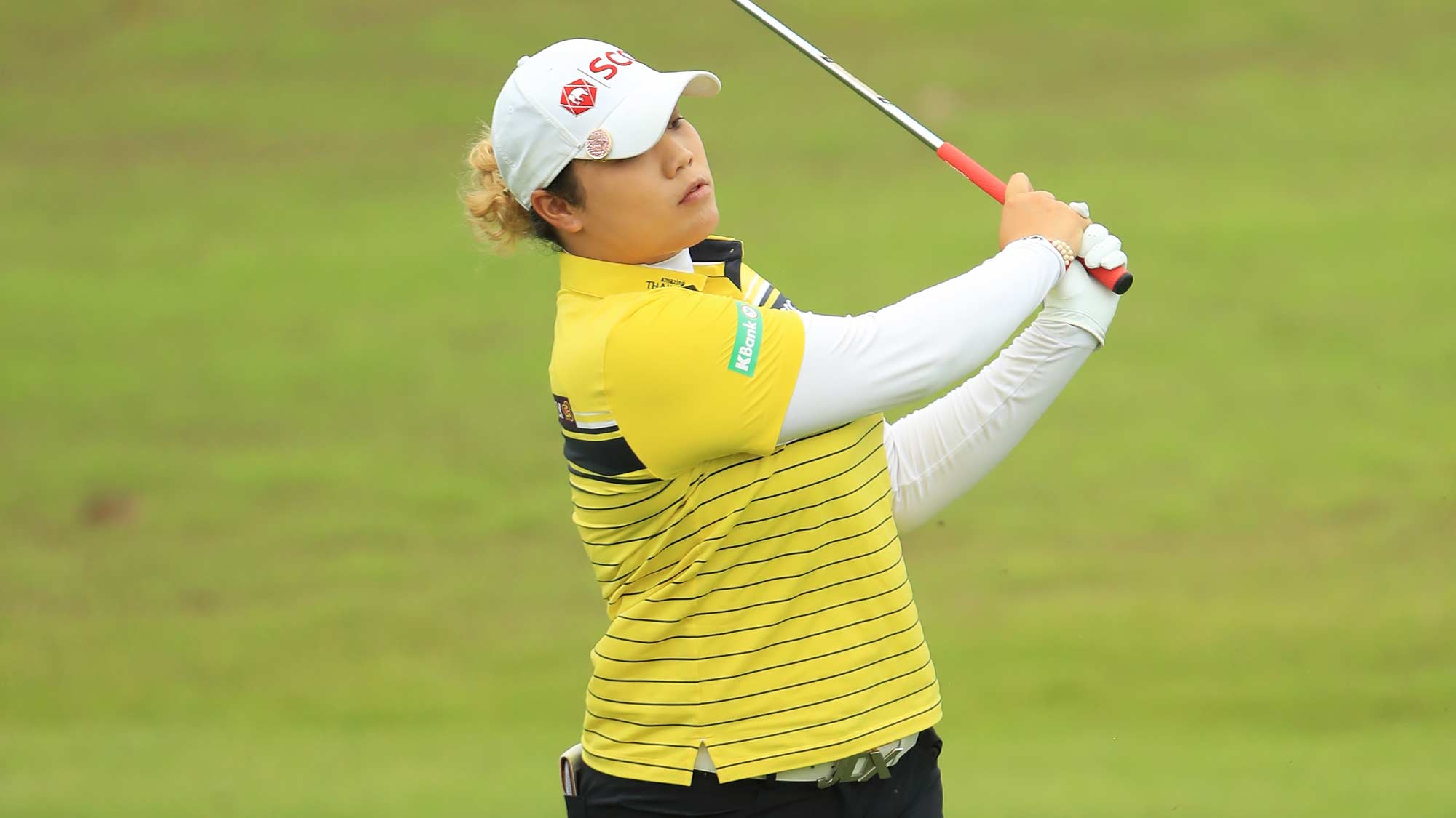 Ariya Jutanugarn of Thailand plays her second shot on the first hole during the first round of the HSBC Women's World Championship at Sentosa Golf Club on February 28, 2019 in Singapore. 