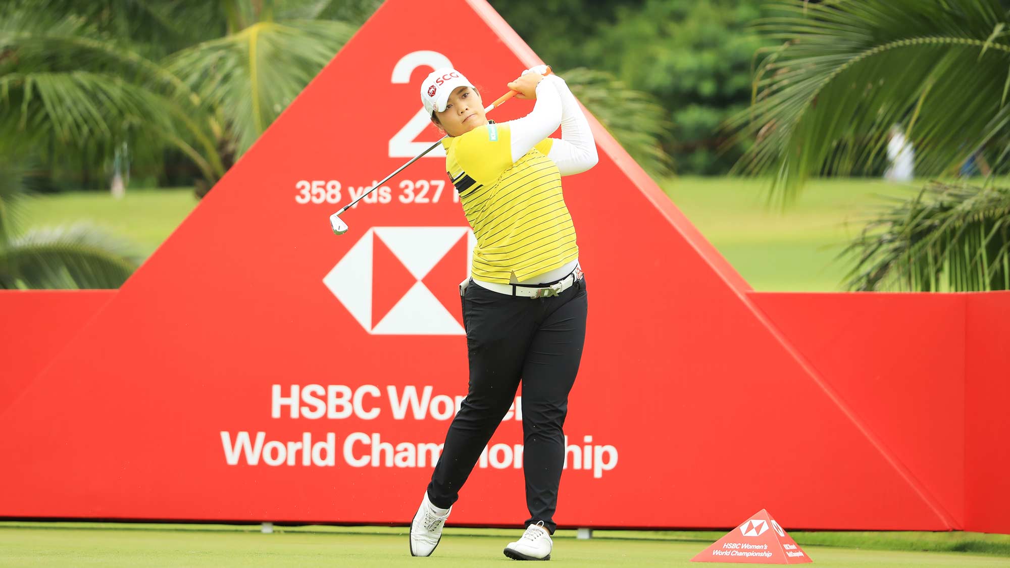 Ariya Jutanugarn of Thailand plays her shot from the second tee during the first round of the HSBC Women's World Championship at Sentosa Golf Club on February 28, 2019 in Singapore. 