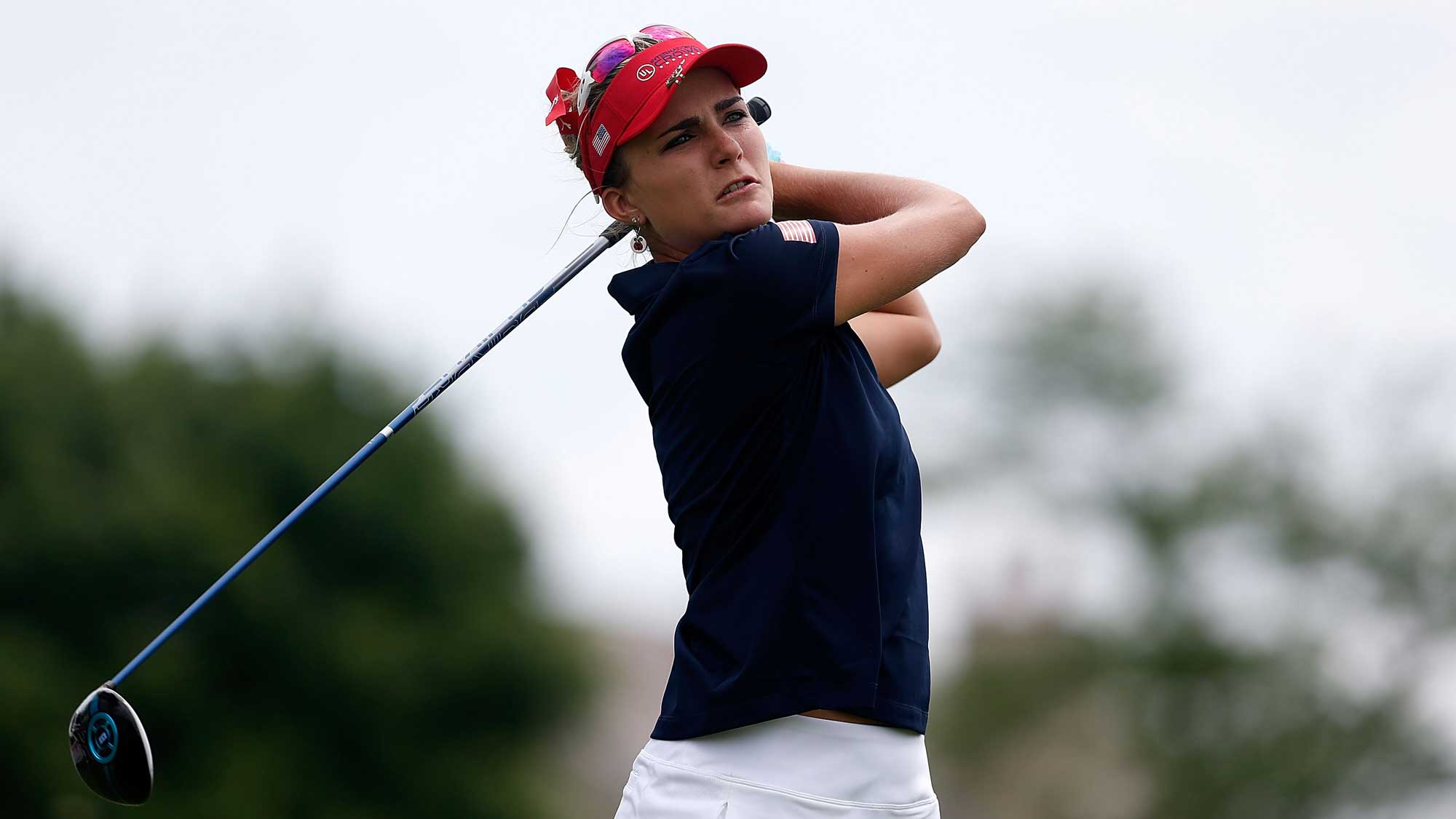 Lexi Thompson of the United States hits her tee shot on the fourth hole during the singles matches of the 2016 UL International Crown