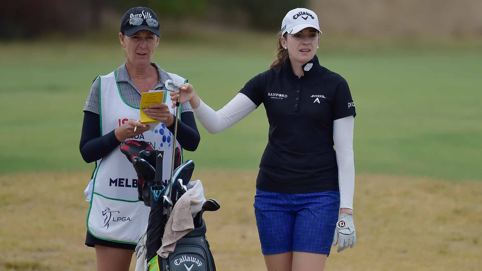 Kim Kaufman stands with her caddie during the second round of the ISPS Handa Vic Open in Geelong, Australia on February 8, 2019