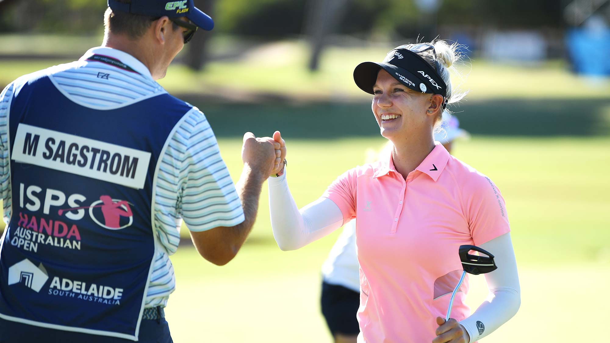 Madelene Sagstrom of Sweden fist pumps her caddie after fininshing eaqual leader during day two of the 2019 ISPS Handa Women's Australian Open 