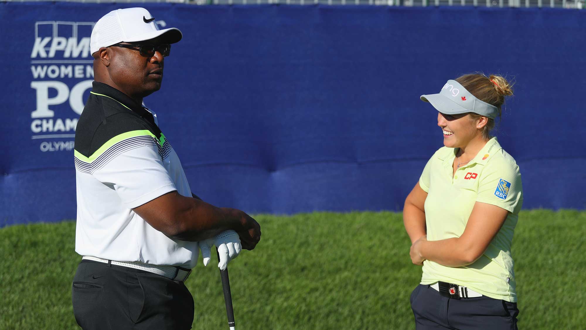 Former NFL star Bo Jackson (L) chats with Brooke Henderson of Canada during the pro-am prior to the start of the 2017 KPMG Women's PGA Championship