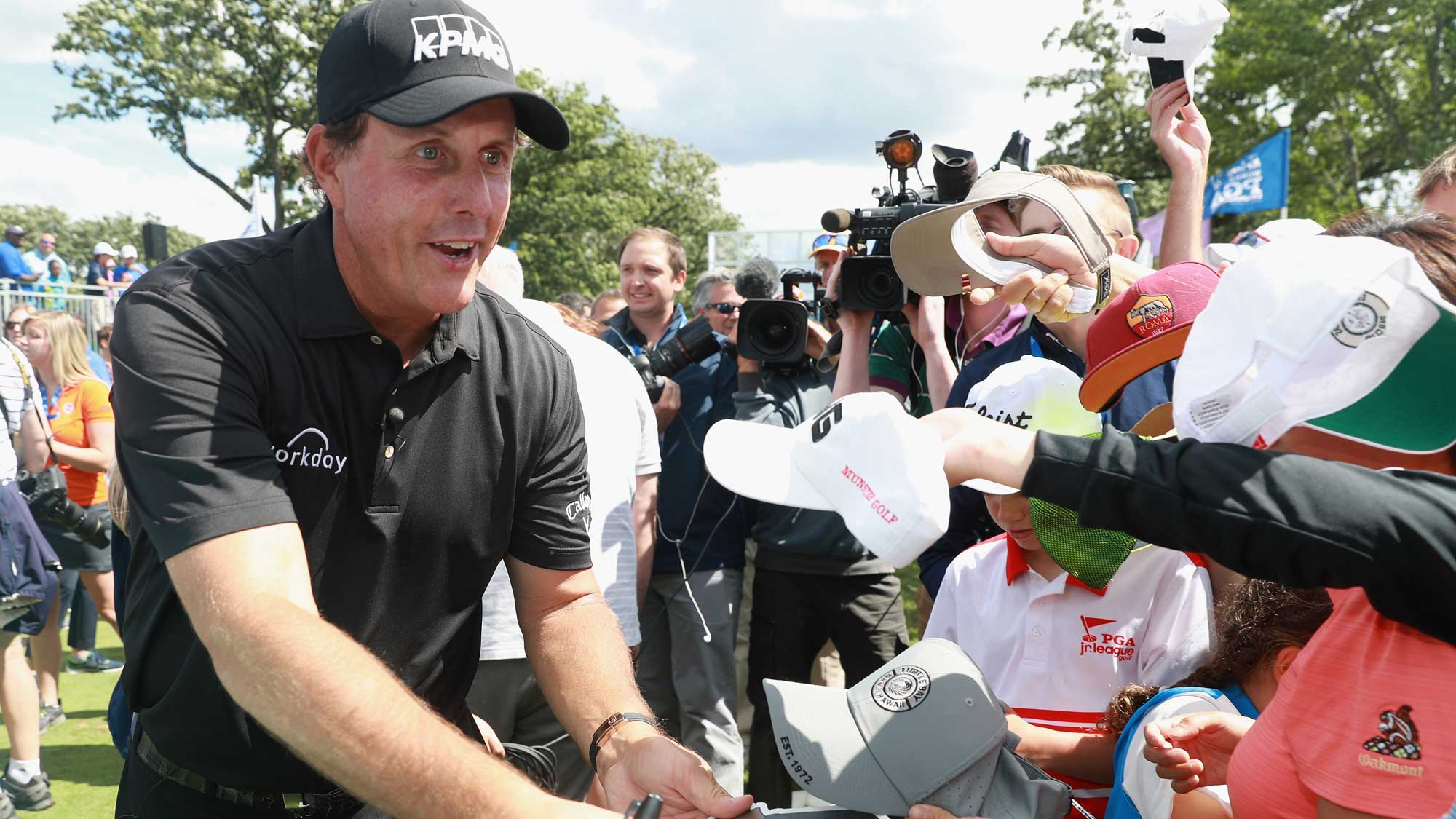 Phil Mickelson signs autographs for fans during a skills challenge prior to the start of the 2017 KPMG Women's PGA Championship
