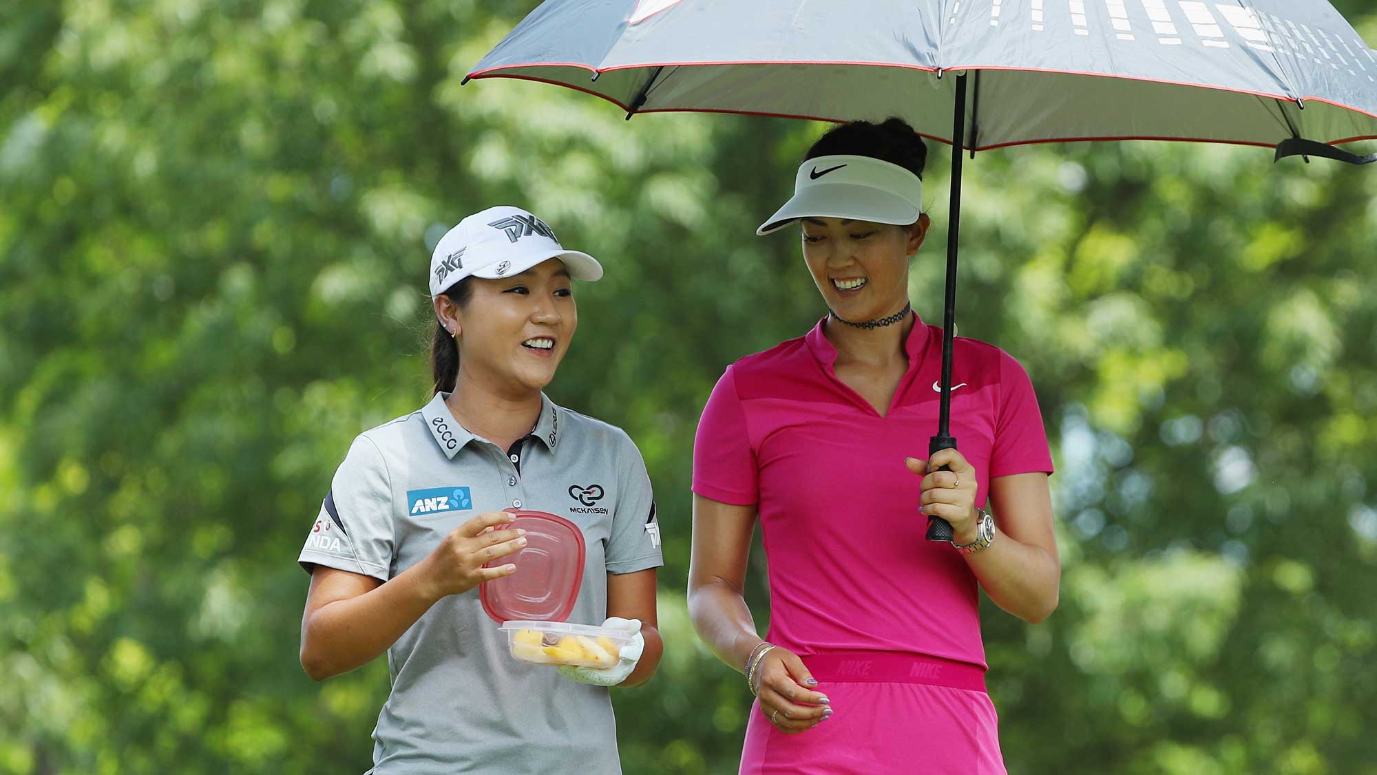 Michelle Wie and Lydia Ko of New Zealand wait together on the ninth hole during the third round of the 2017 KPMG Women's PGA Championship
