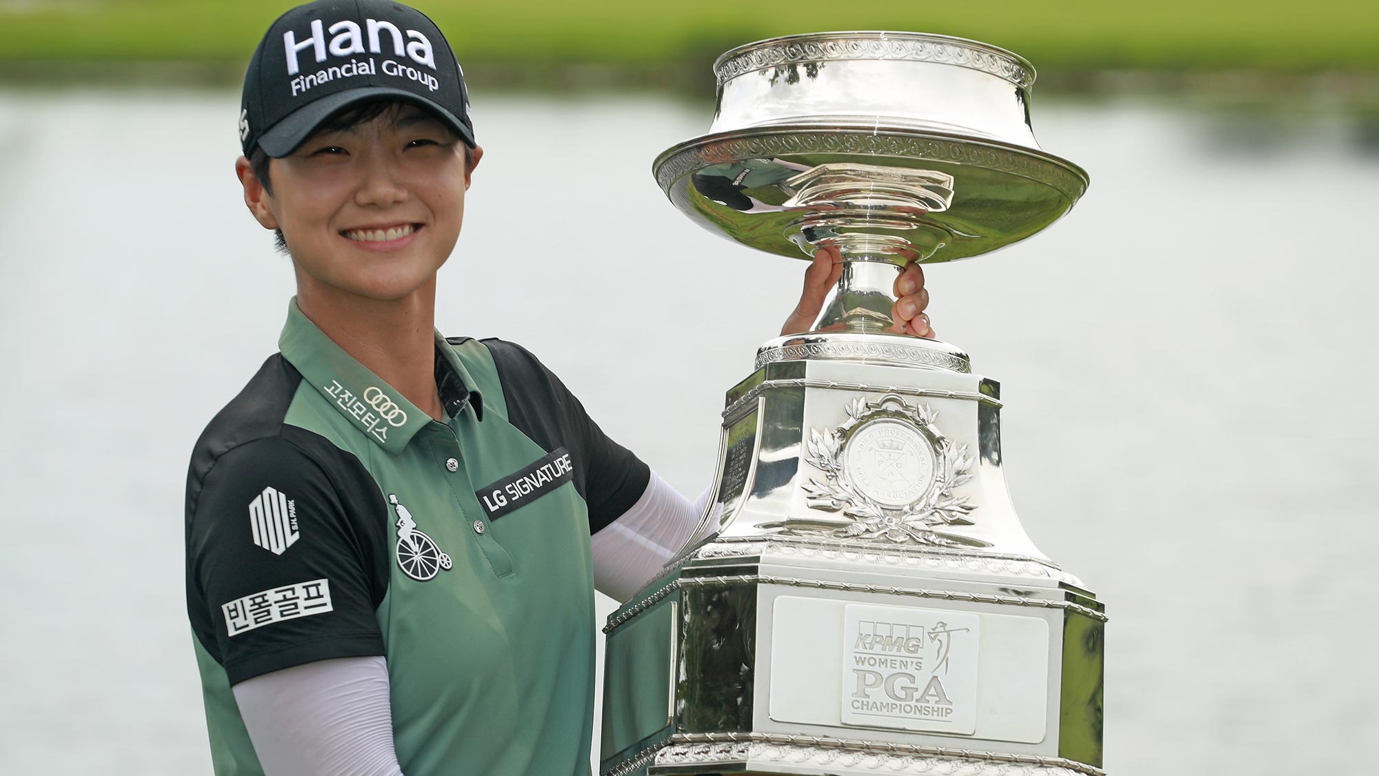 Sung Hyun Park of South Korea celebrates with the trophy after winning the KPMG Women's PGA Championship at Kemper Lakes Golf Club 