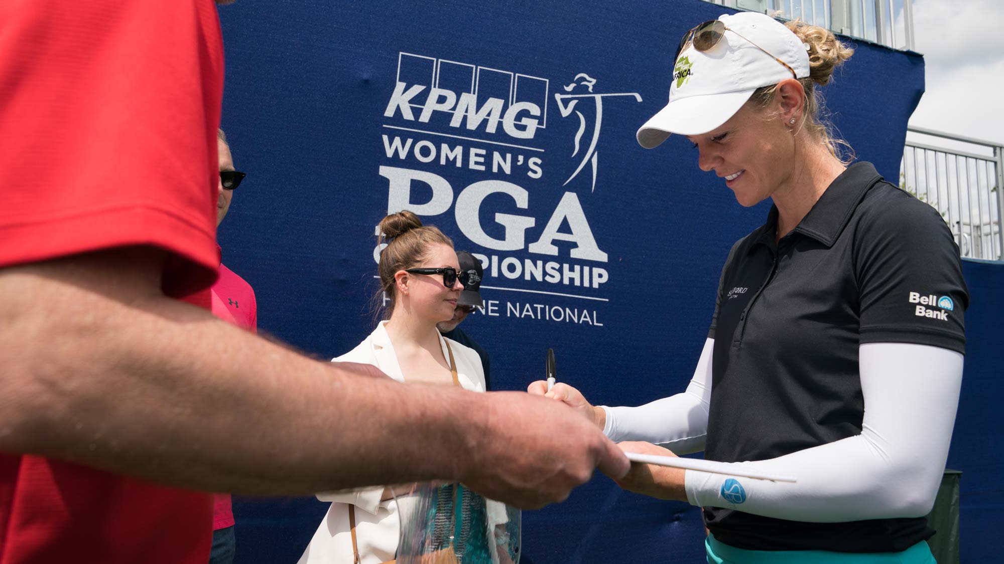 Amy Olson signs autographs during the practice round for the 65th KPMG Women’s PGA Championship