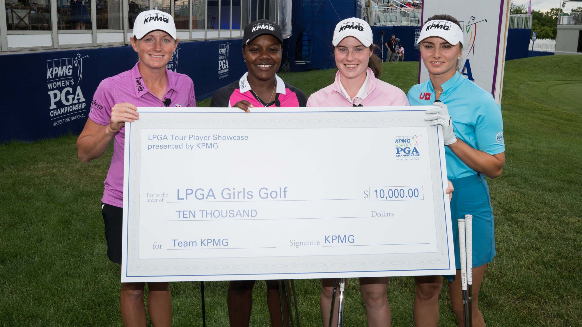 Stacy Lewis, Mariah Stackhouse, Leona Maguire and Klara Spilkova pose for a photo with the winning check during the KPMG Player Showcase for the 65th KPMG Women’s PGA Championship