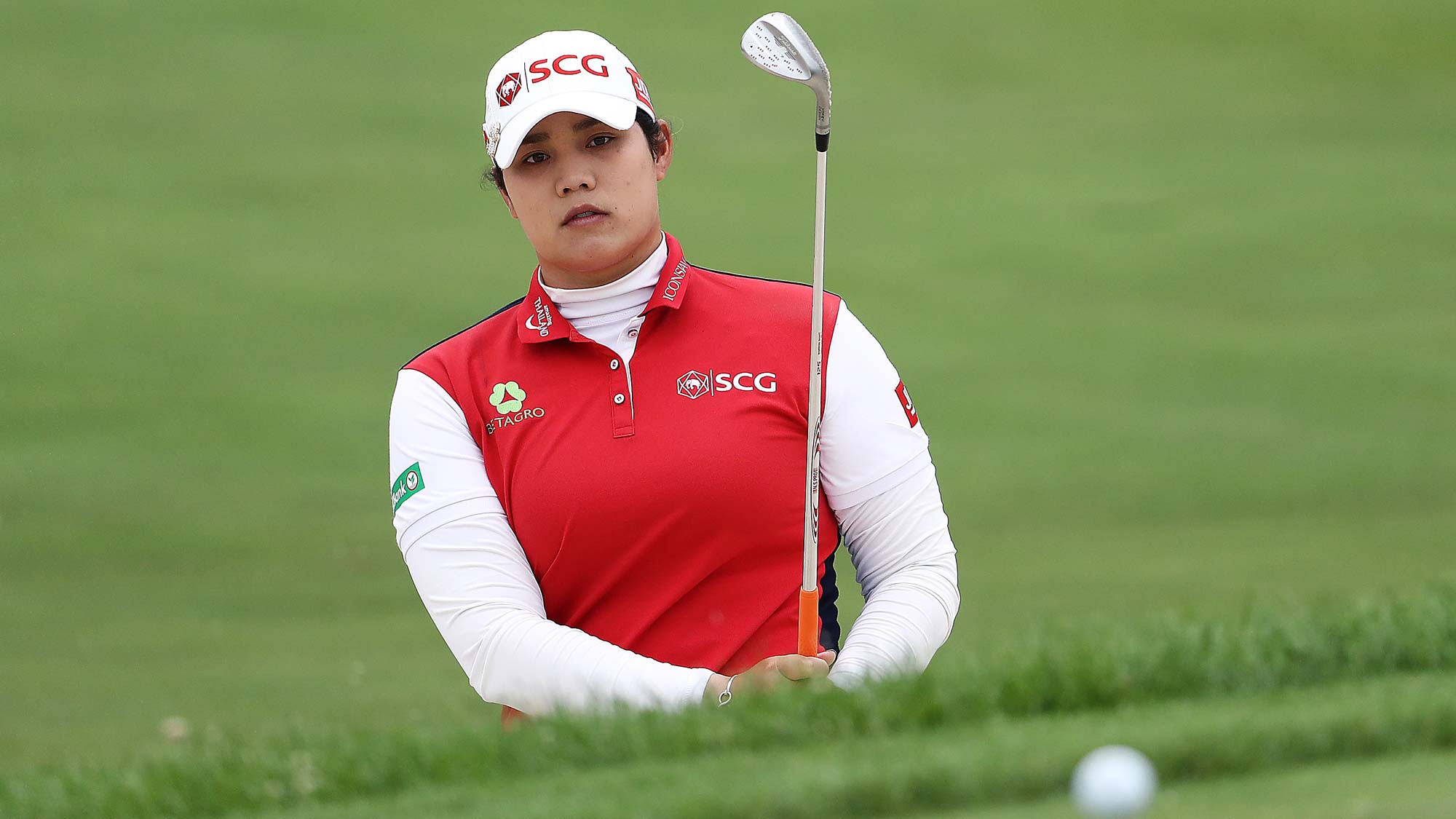 Ariya Jutanugarn of Thailand hits her third shot on the 1st hole from a bunker during the third round of the KPMG Women's PGA Championship 