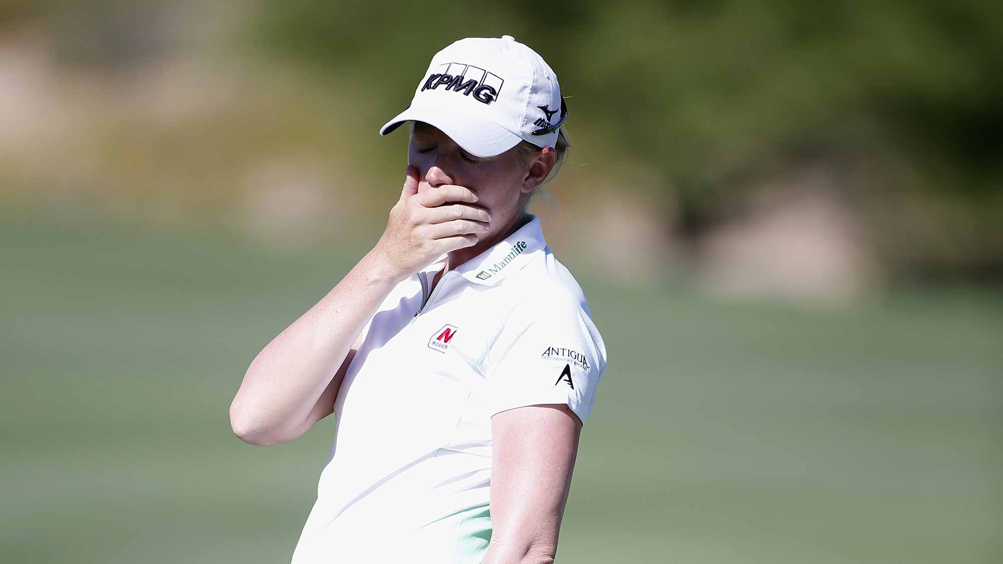 Stacy Lewis reacts after a missed putt on the 7th green during the final round of the LPGA JTBC Founders Cup at Wildfire Golf Club