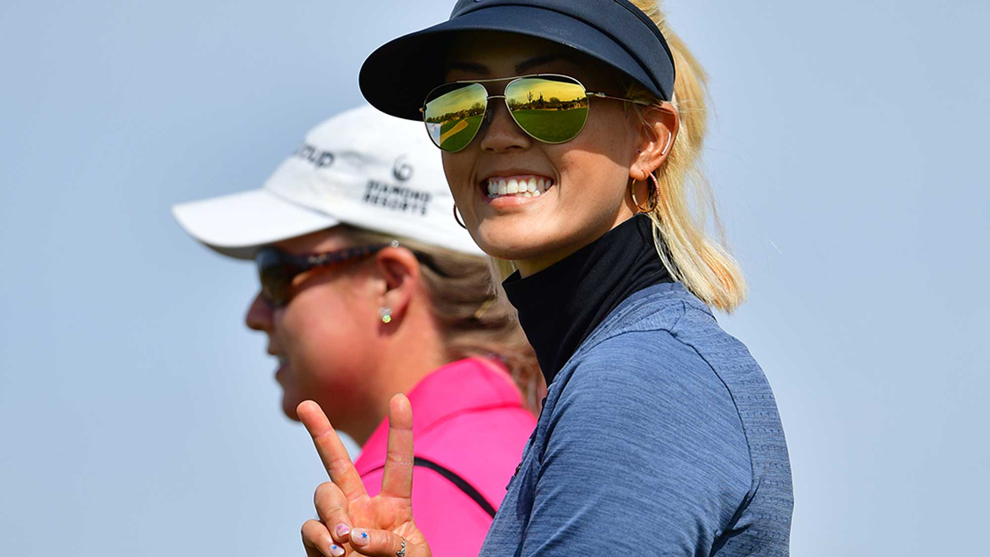 Michelle Wie Gives the Peace Sign to the Camera