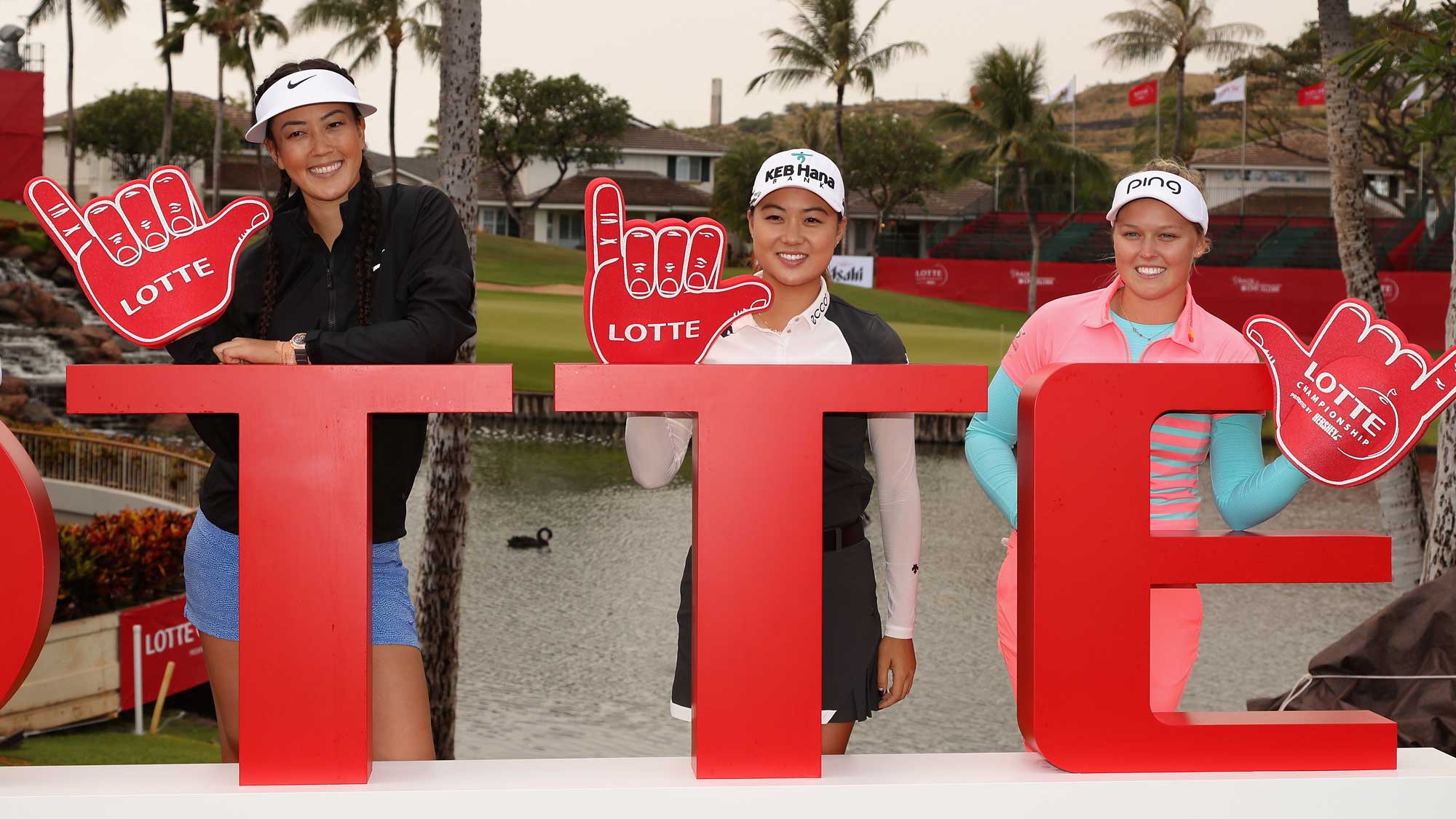 (L-R) Michelle Wie, Minjee Lee and Brooke M. Henderson pose together at a photo call ahead of the LPGA LOTTE Championship Presented By Hershey at Ko Olina Golf Club 
