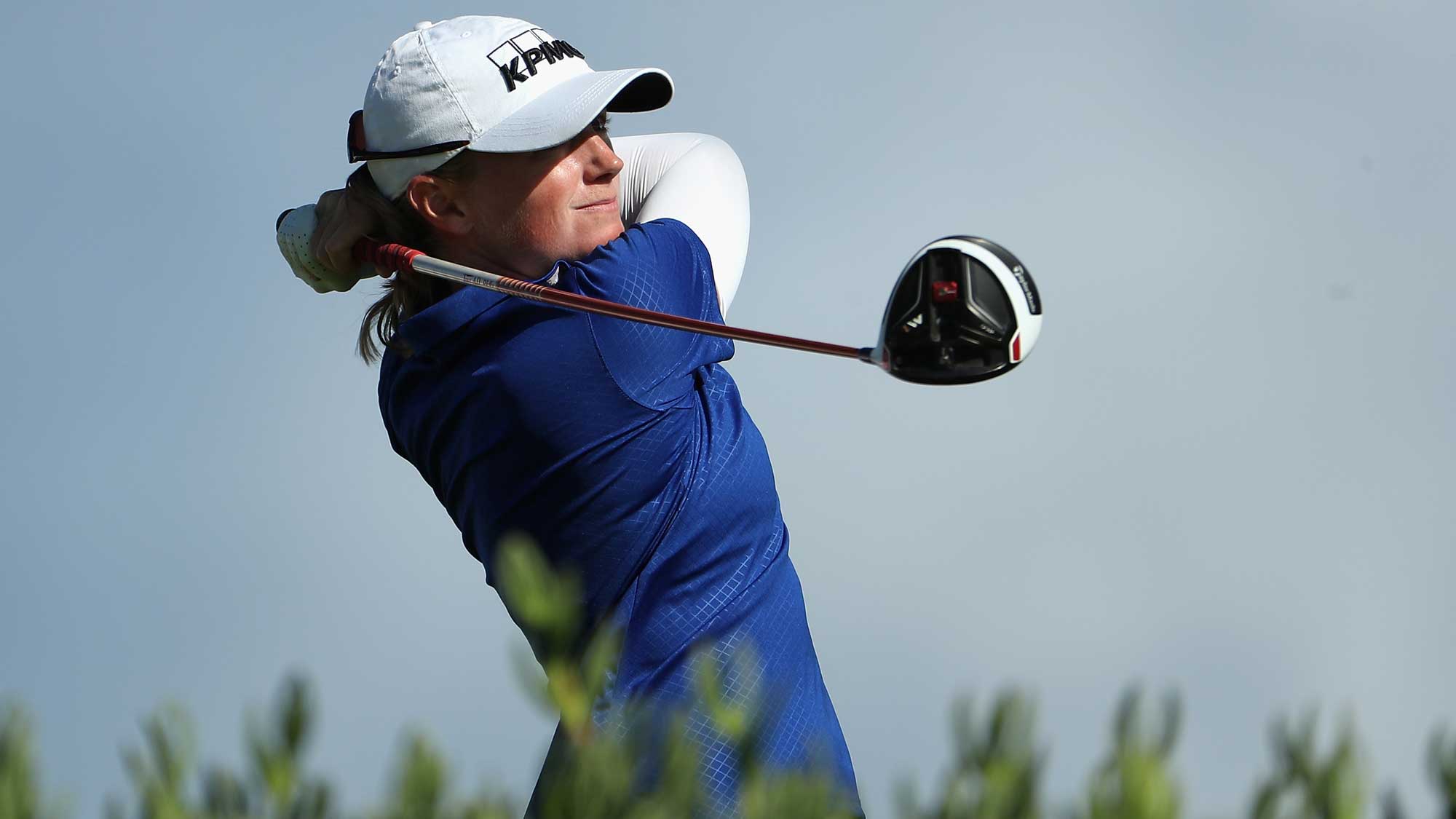 Stacy Lewis plays a tee shot on the 13th hole during the first round of the LPGA LOTTE Championship Presented By Hershey